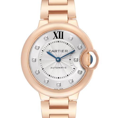 The Cartier Ballon Bleu WE902039 Women's Rose Gold Silver Dial watch is shown from a front angle, displaying the face, crown, and part of the bracelet.