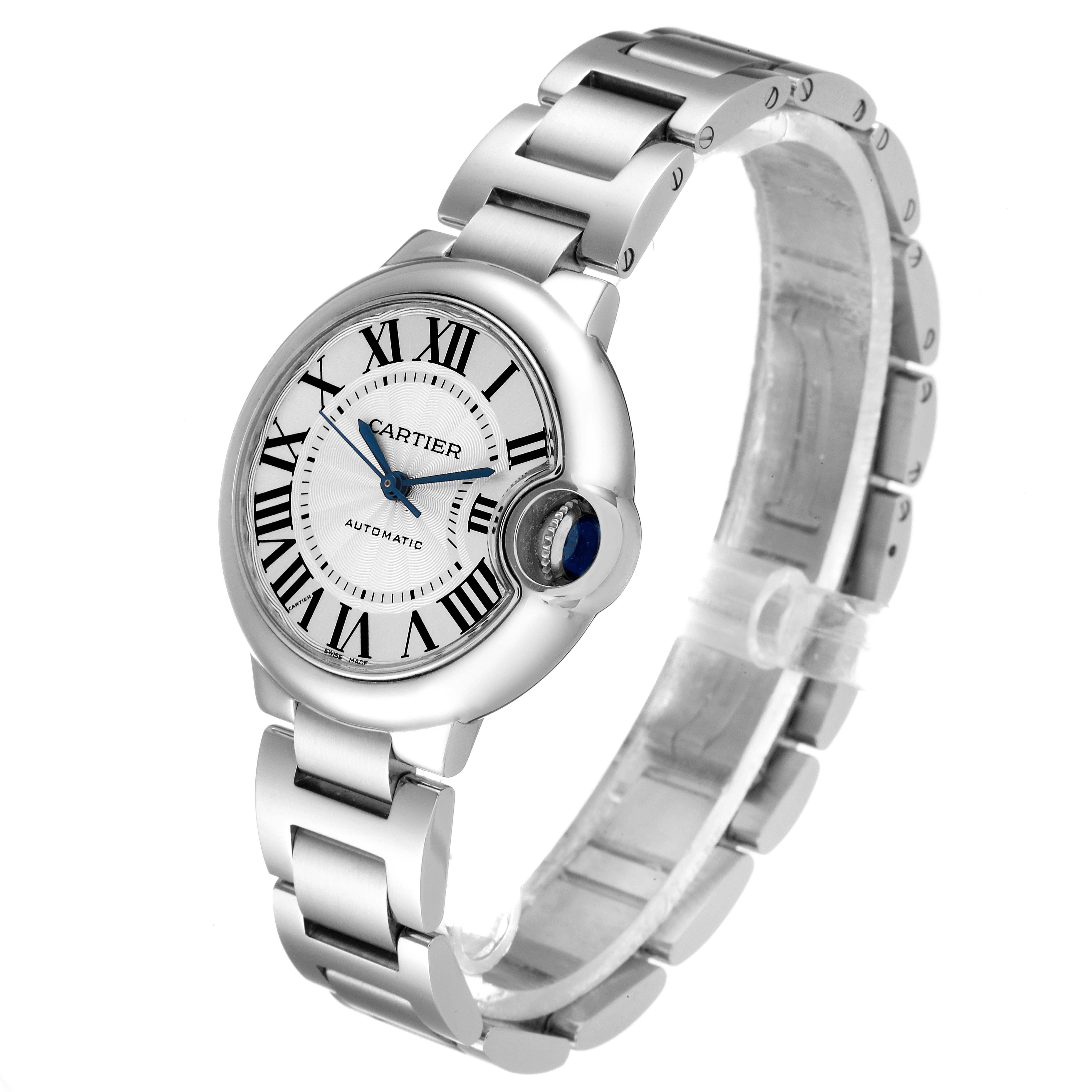The image shows the face and metal bracelet of a Cartier Ballon Bleu W6920071 Women
s Stainless Steel Silver Dial W6920071 Women
s Stainless Steel Silver Dial watch from a front-side angle.