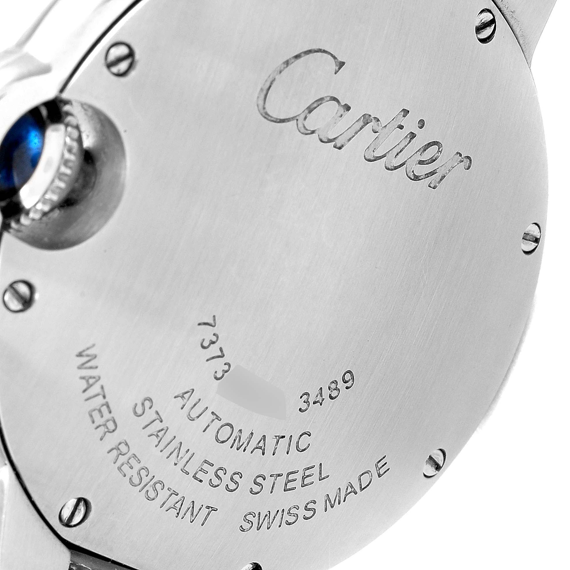 The image shows the back case of a Ballon Bleu model by Cartier, displaying its engravings and crown.