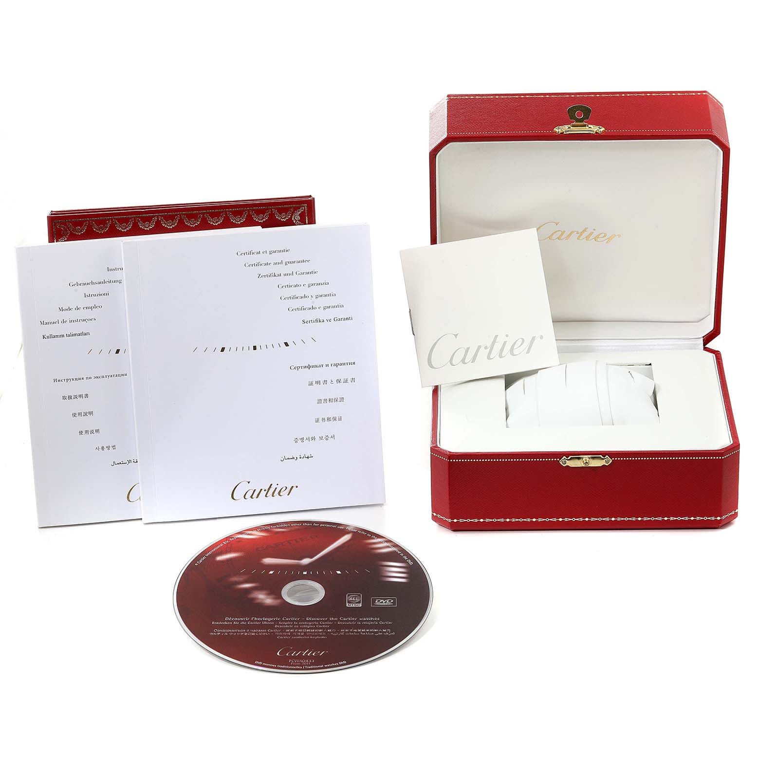 The image shows a red Cartier Ballon Bleu W6920003 Men
s Stainless Steel Silver Dial W6920003 Men
s Stainless Steel Silver Dial watch box, warranty cards, manuals, and a DVD from an angled front view.