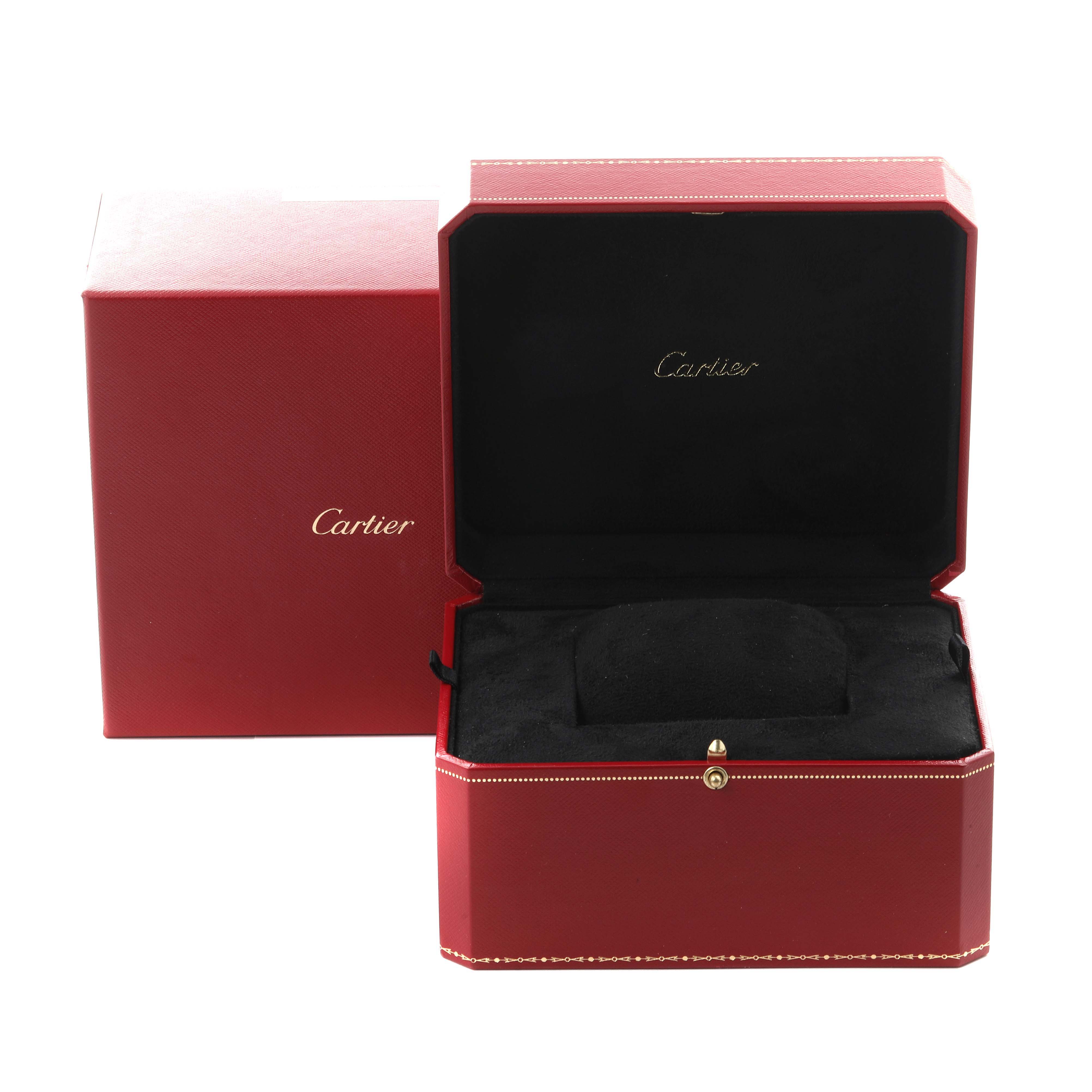 The image shows the open red watch box for the Cartier Ballon Bleu WE9003Z3 Women
s White Gold Silver Dial WE9003Z3 Women
s White Gold Silver Dial model, with a logo inside.