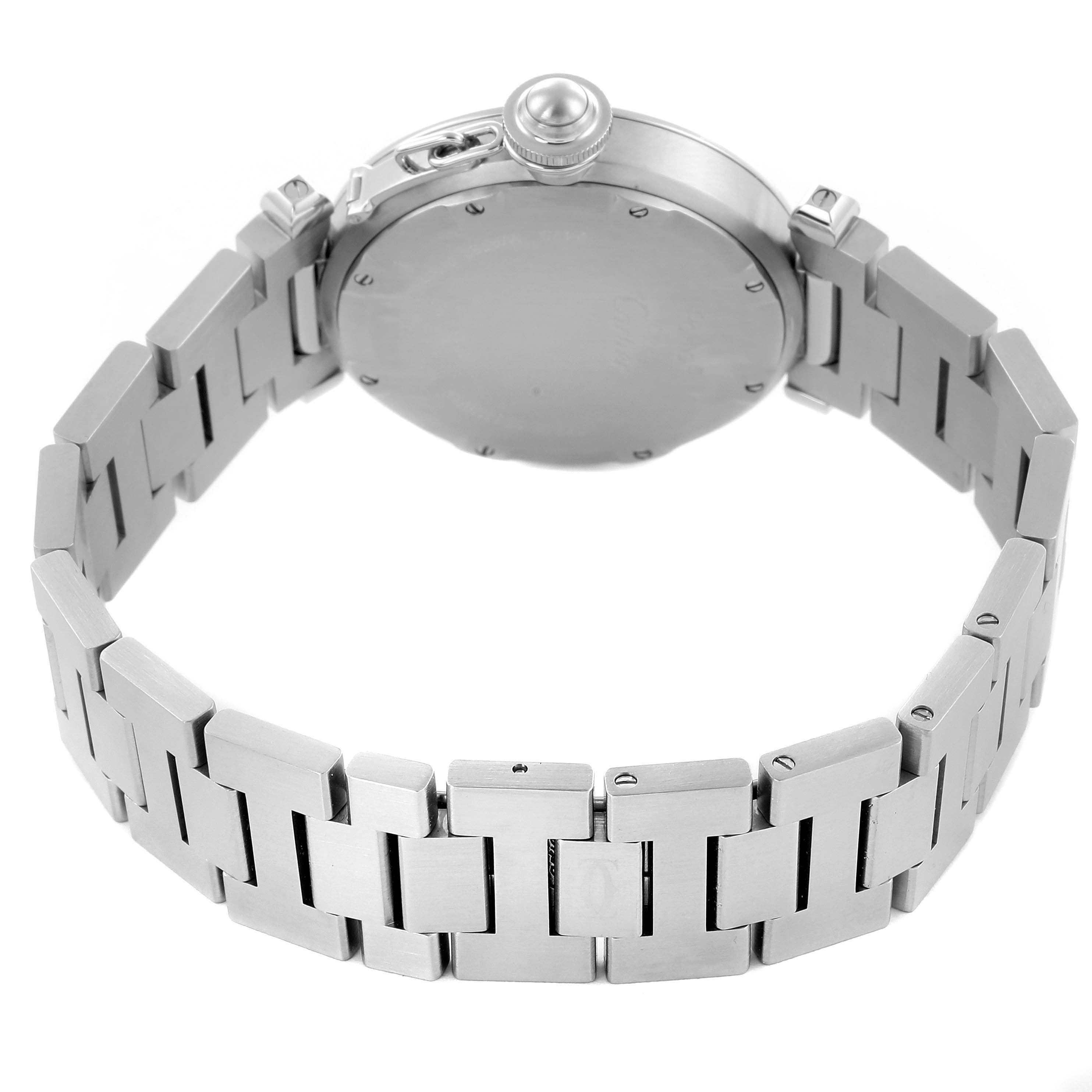 The Cartier Pasha W31058M7 Women's Stainless Steel Pink Dial W31058M7 Women's Stainless Steel Pink Dial watch is shown from the back, highlighting the bracelet and case back with its distinctive crown design.