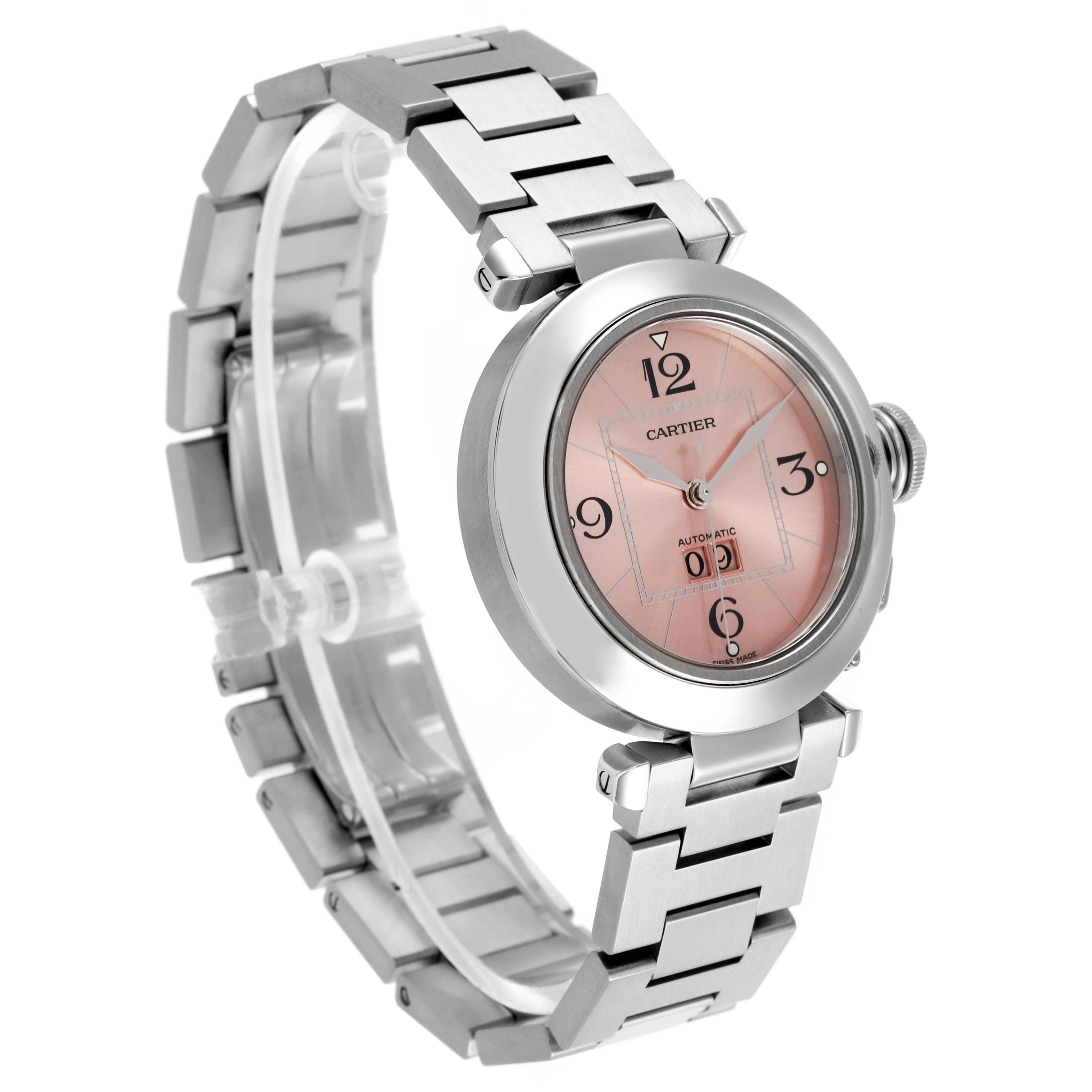 The Cartier Pasha W31058M7 Women's Stainless Steel Pink Dial W31058M7 Women's Stainless Steel Pink Dial watch is shown at a slight angle, highlighting the face, bezel, crown, and bracelet.