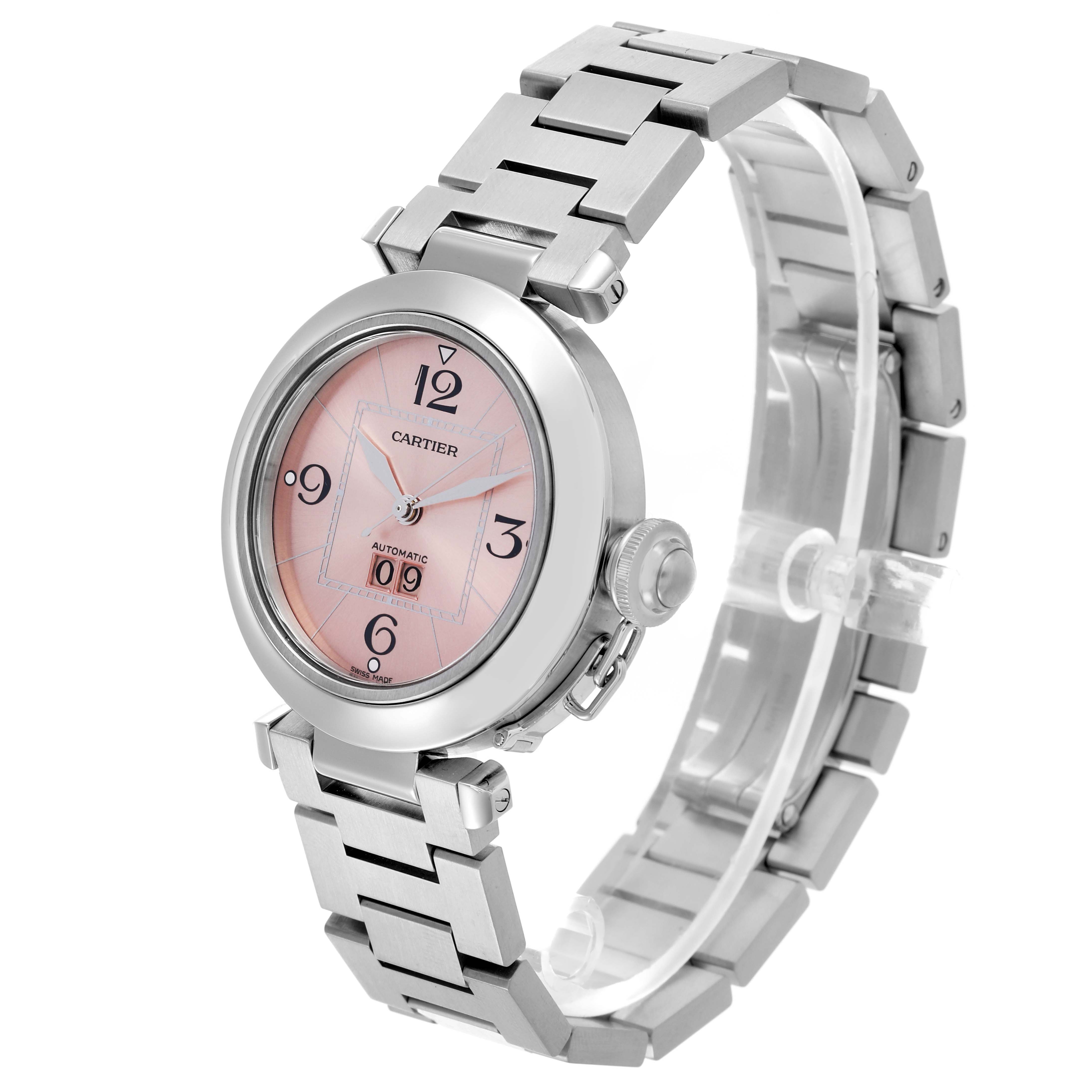 The Cartier Pasha W31058M7 Women's Stainless Steel Pink Dial W31058M7 Women's Stainless Steel Pink Dial watch is shown at a three-quarter angle, highlighting the face, bezel, crown, and bracelet.