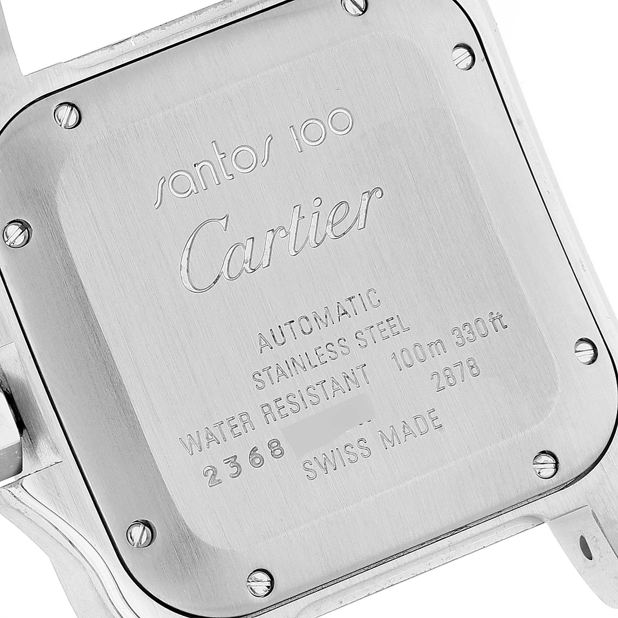 The image shows the back case of a Cartier Santos Men
s Stainless Steel Silver Dial Men
s Stainless Steel Silver Dial 100 watch, detailing specifications and branding.