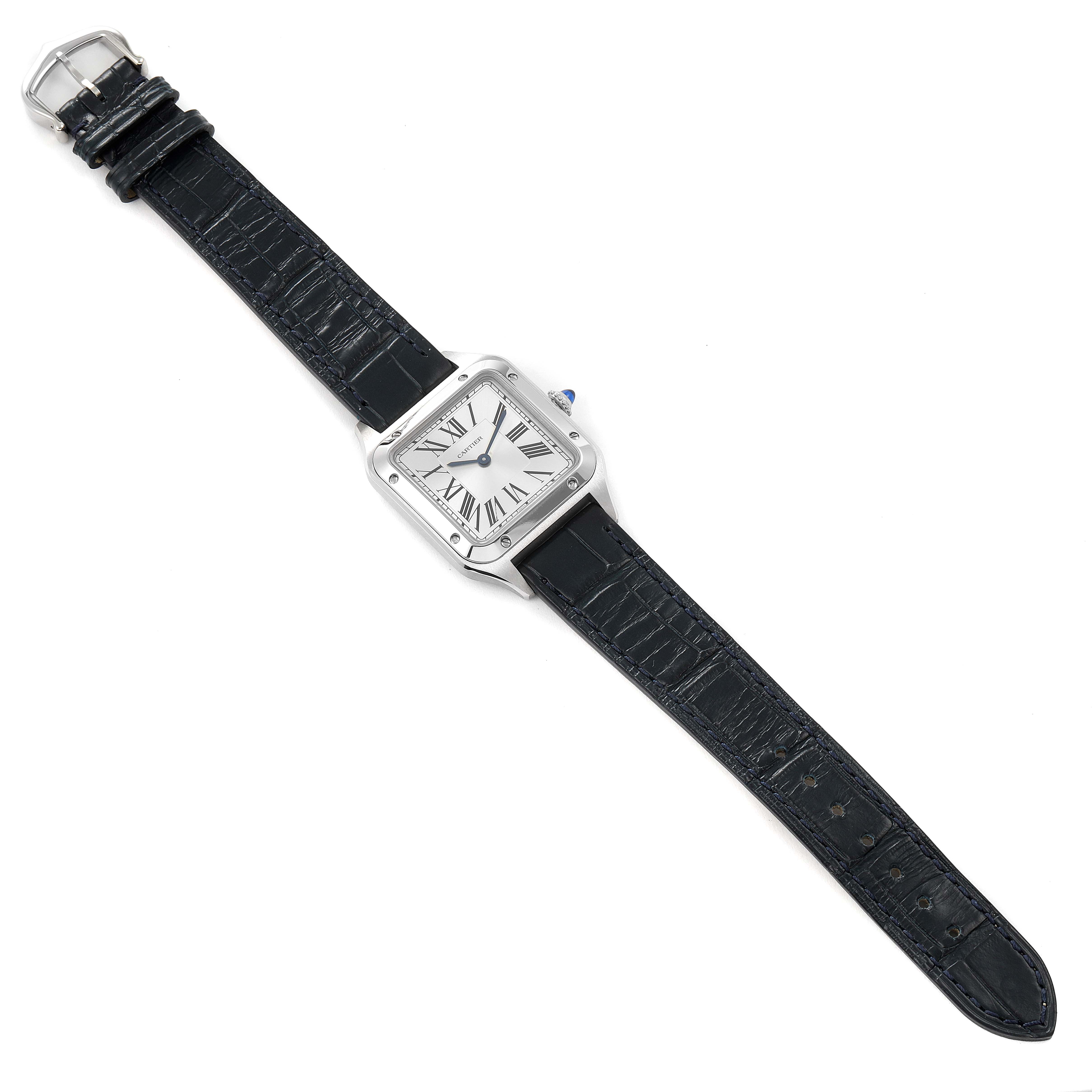 The image shows a Cartier Santos WSSA0023 Women's Stainless Steel Silver Dial WSSA0023 Women's Stainless Steel Silver Dial watch laid flat with a black leather strap and a square face displaying Roman numerals.