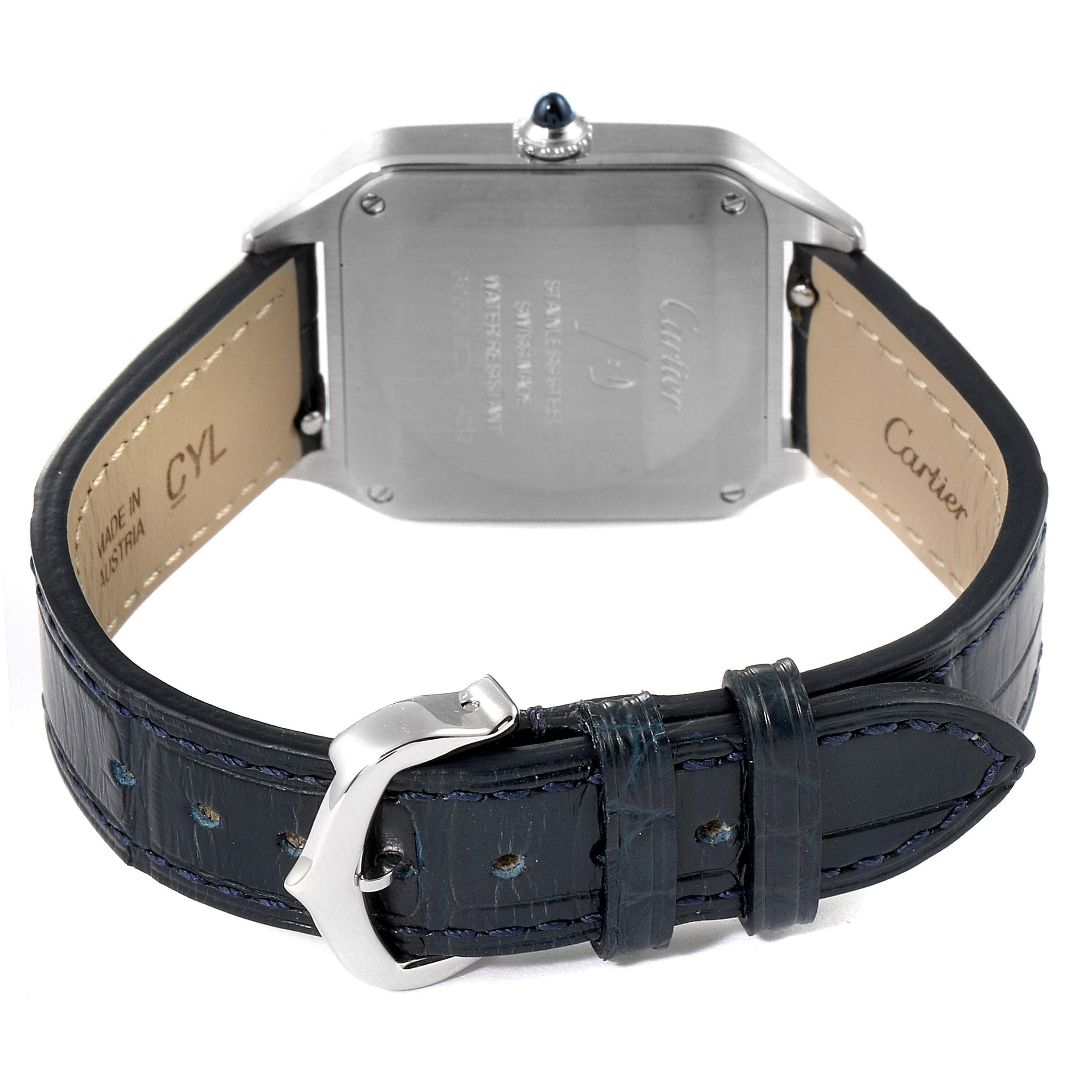 This image shows the back case and leather strap of the Santos model by Cartier, highlighting the buckle and the engraved back.