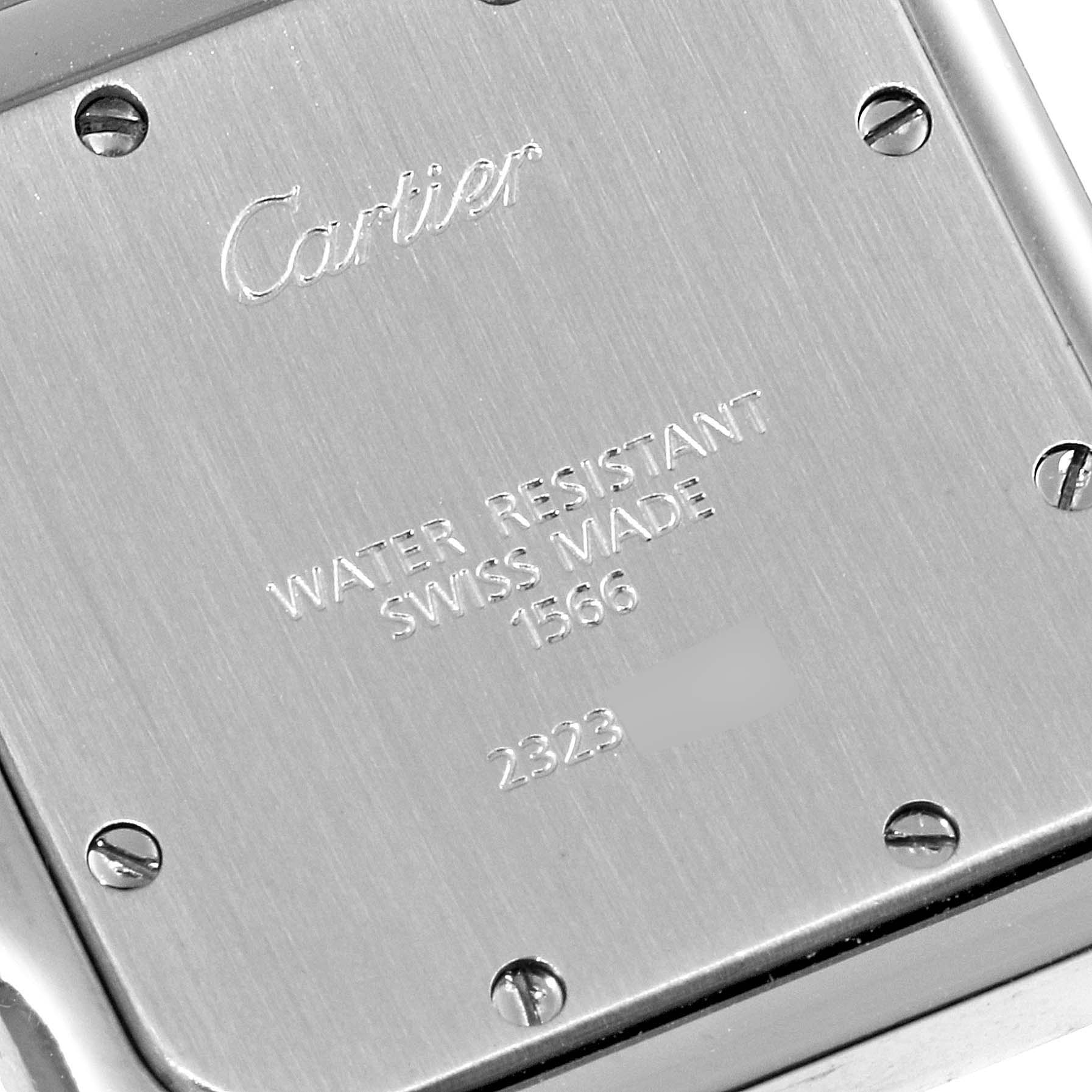 This image shows the engraved back case of a Cartier Santos W20011C4 Men
s Steel and Gold (two tone) Silver Dial W20011C4 Men
s Steel and Gold (two tone) Silver Dial watch detailing its water resistance and Swiss-made origins.