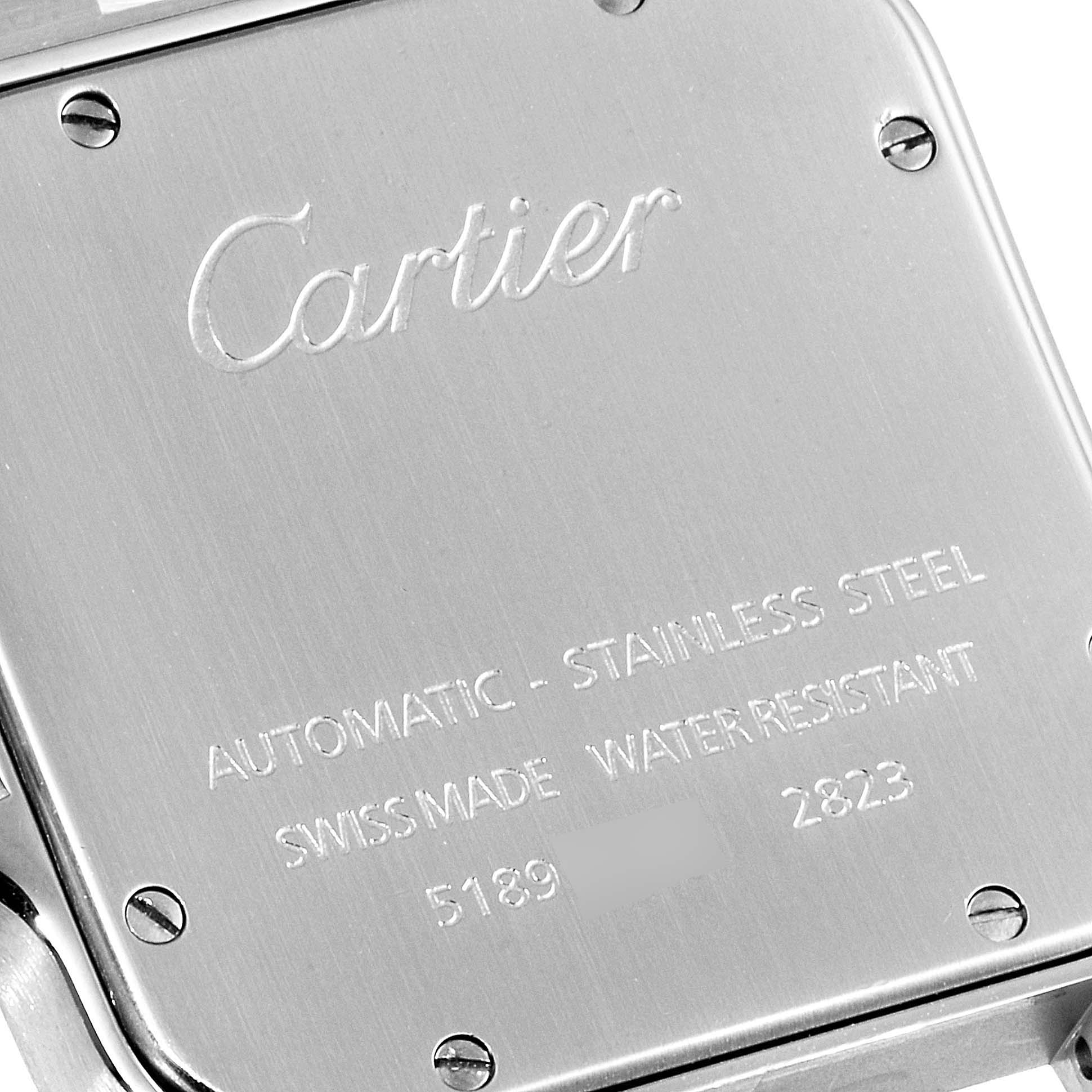 This image shows the back case of a Cartier Santos W20098D6 Men's Stainless Steel Silver Dial W20098D6 Men's Stainless Steel Silver Dial watch, displaying branding and specifications.