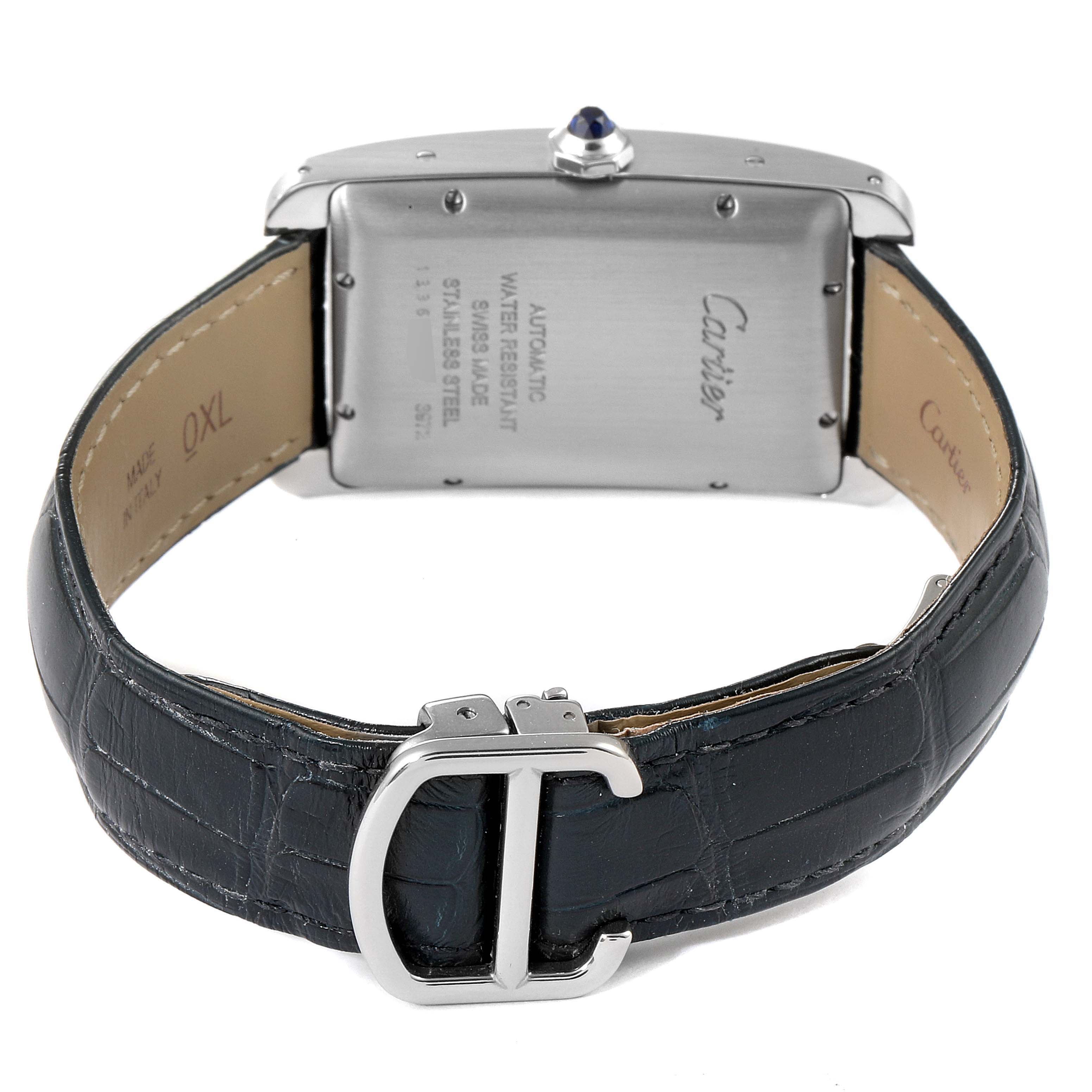 This Cartier Tank Americaine WSTA0018 Men
s Stainless Steel Silver Dial WSTA0018 Men
s Stainless Steel Silver Dial watch is shown from the back, displaying its caseback and leather strap with a buckle.