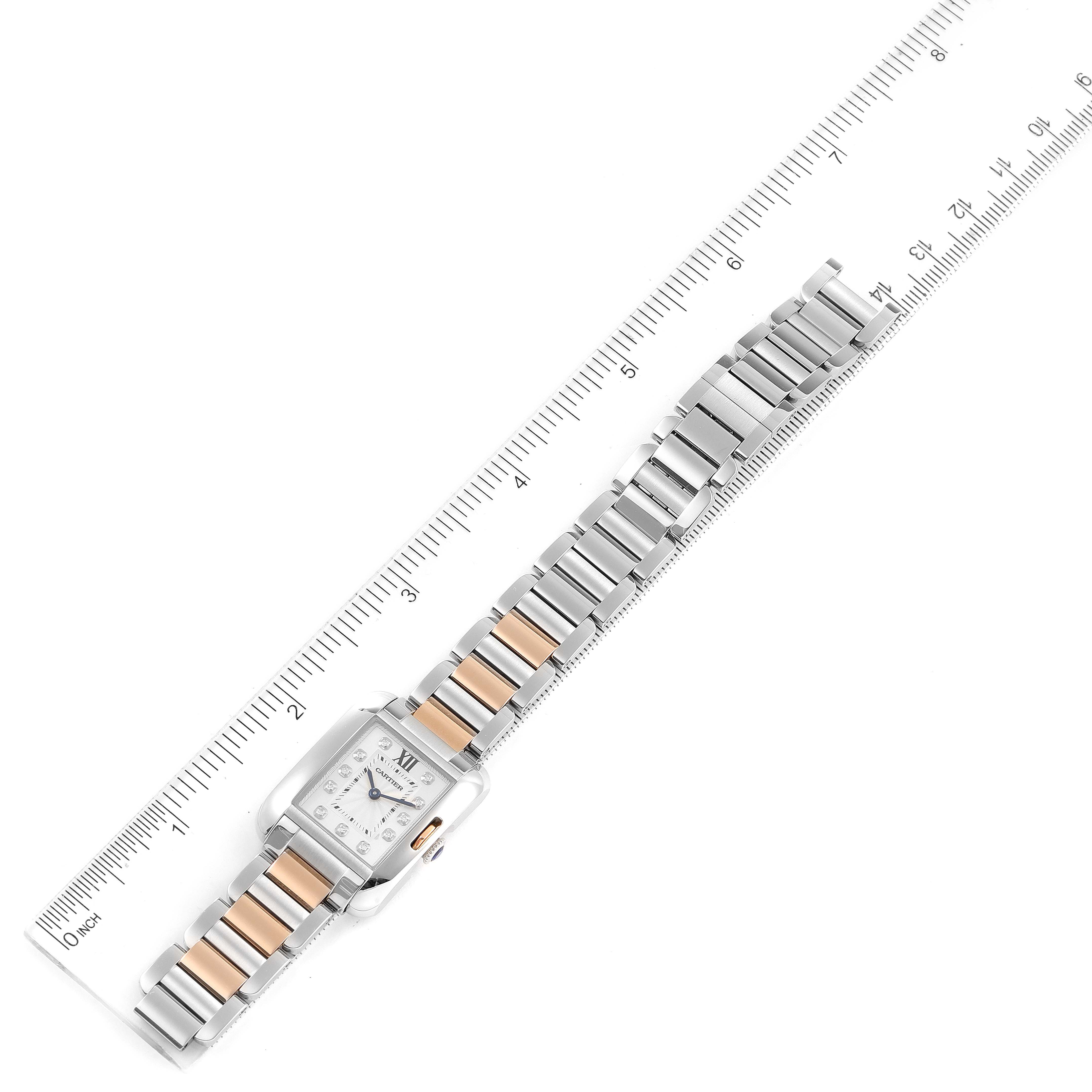 The Cartier Tank Anglaise WT100024 Women's Steel and Gold (two tone) Silver Dial WT100024 Women's Steel and Gold (two tone) Silver Dial watch is displayed flat with a ruler placed alongside for size reference.