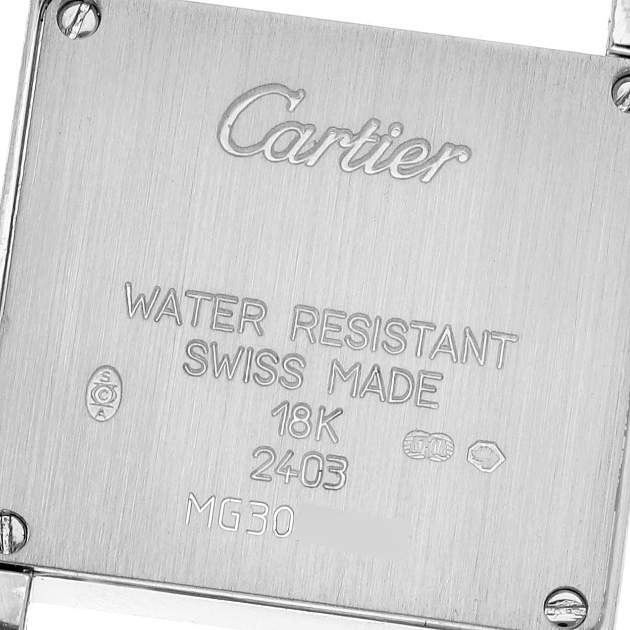 This image shows the back case of the Tank Française model by Cartier, highlighting its engravings and markings.