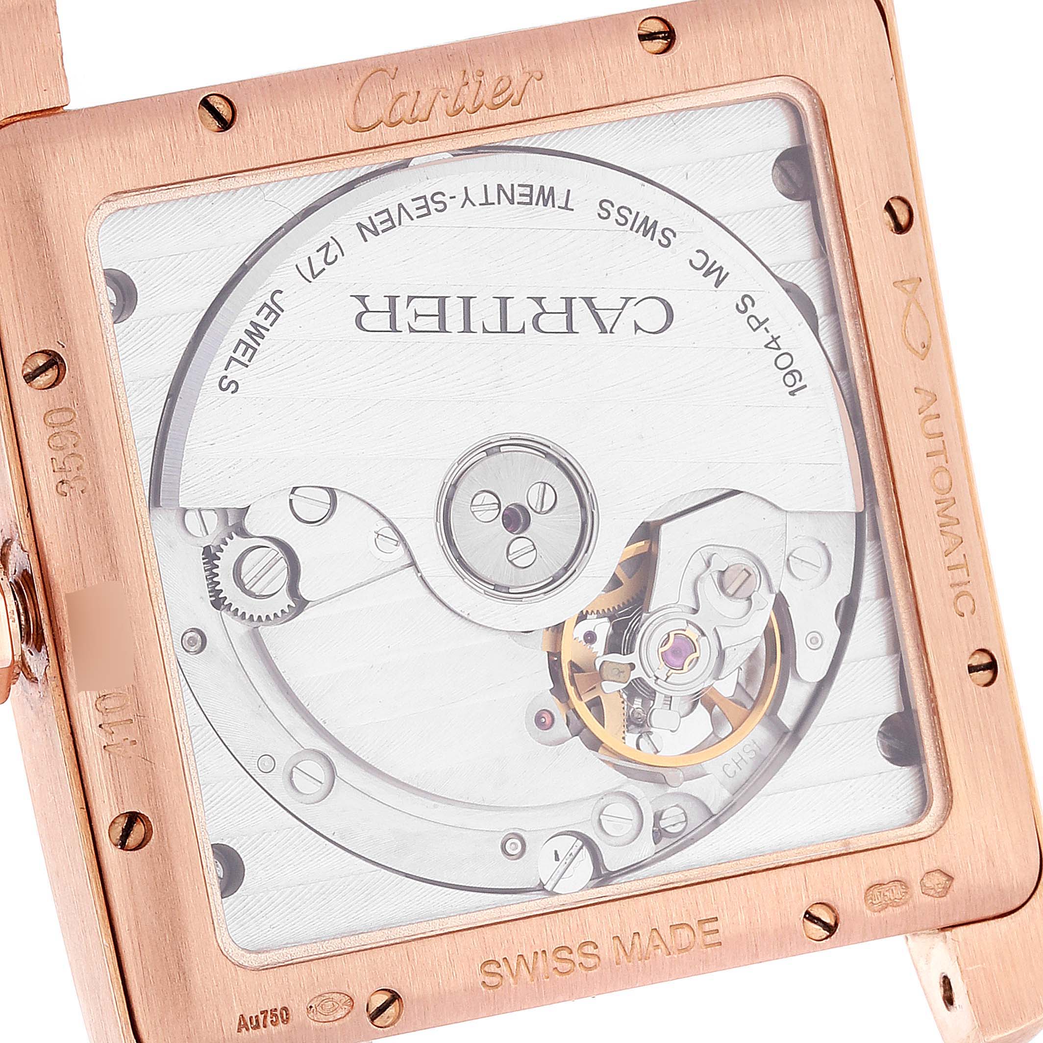 The image shows a close-up of the back of a Cartier Tank MC W5330002 Men's Rose Gold Brown Dial W5330002 Men's Rose Gold Brown Dial watch, revealing its mechanical movement.