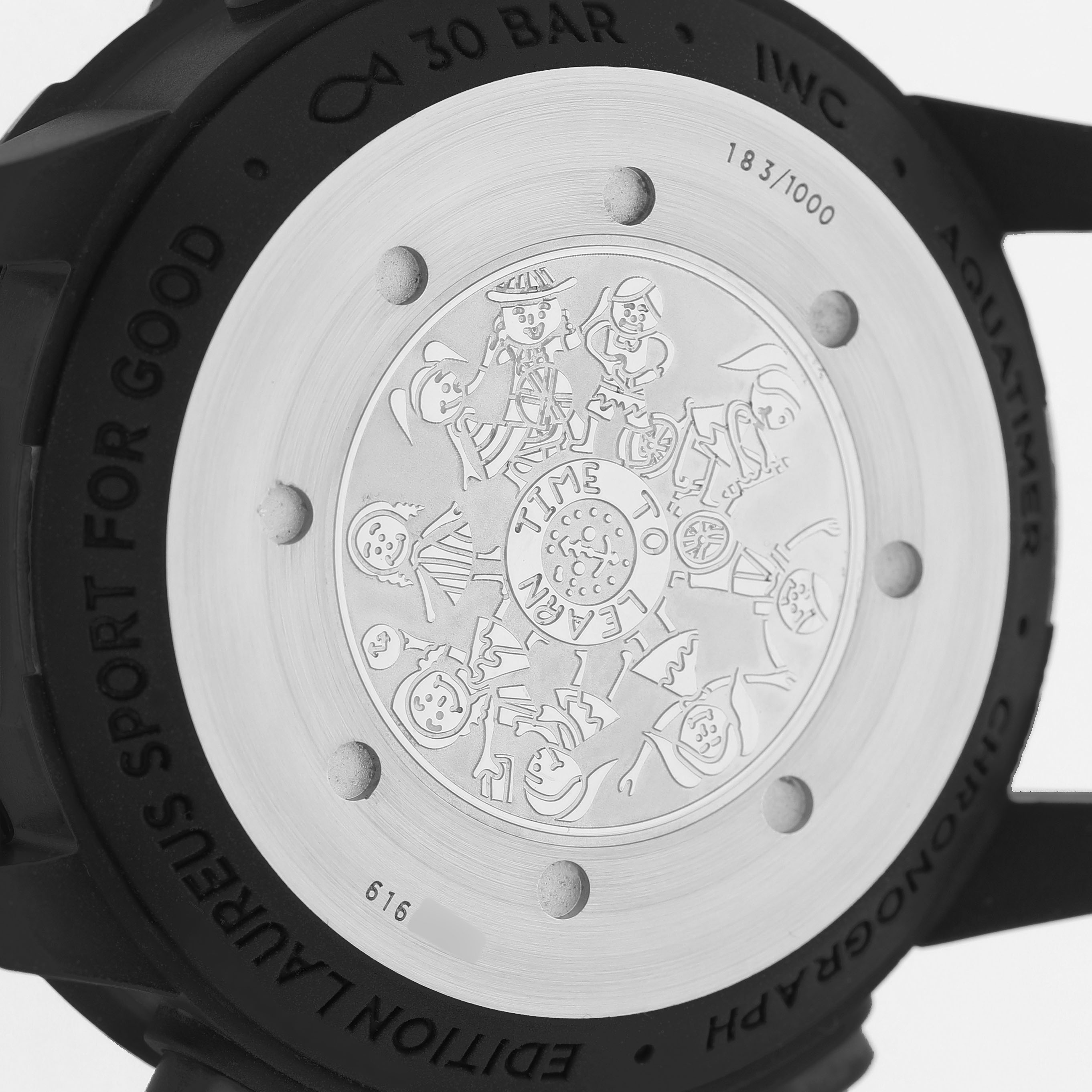 The image shows the back case of the IWC Aquatimer IW379507 Men's Stainless Steel Blue Dial watch with an engraved design and lettering.