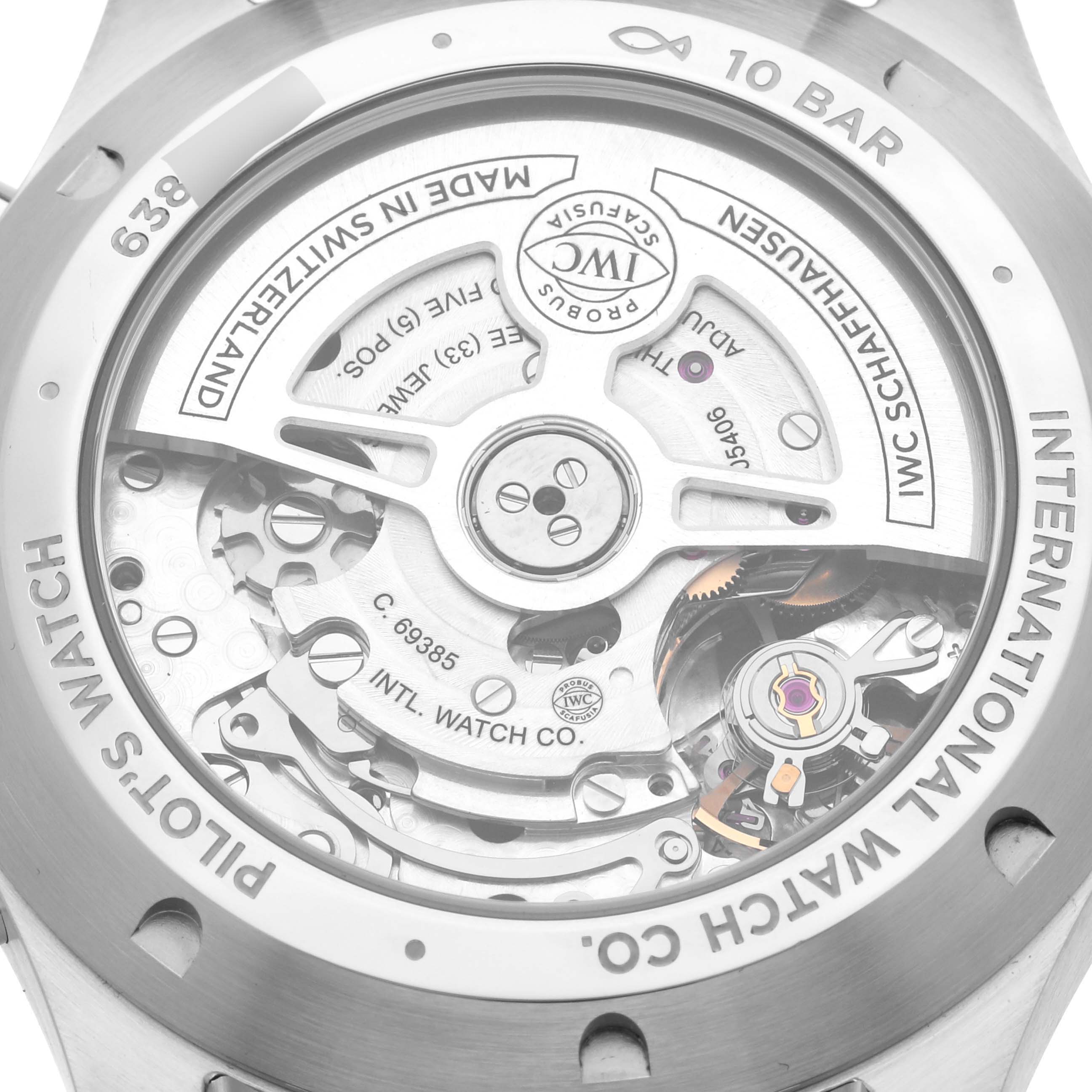 The image shows the back of an IWC Pilot IW378005 Men's Stainless Steel Green Dial IW378005 Men's Stainless Steel Green Dial model watch, highlighting the movement and rotor.