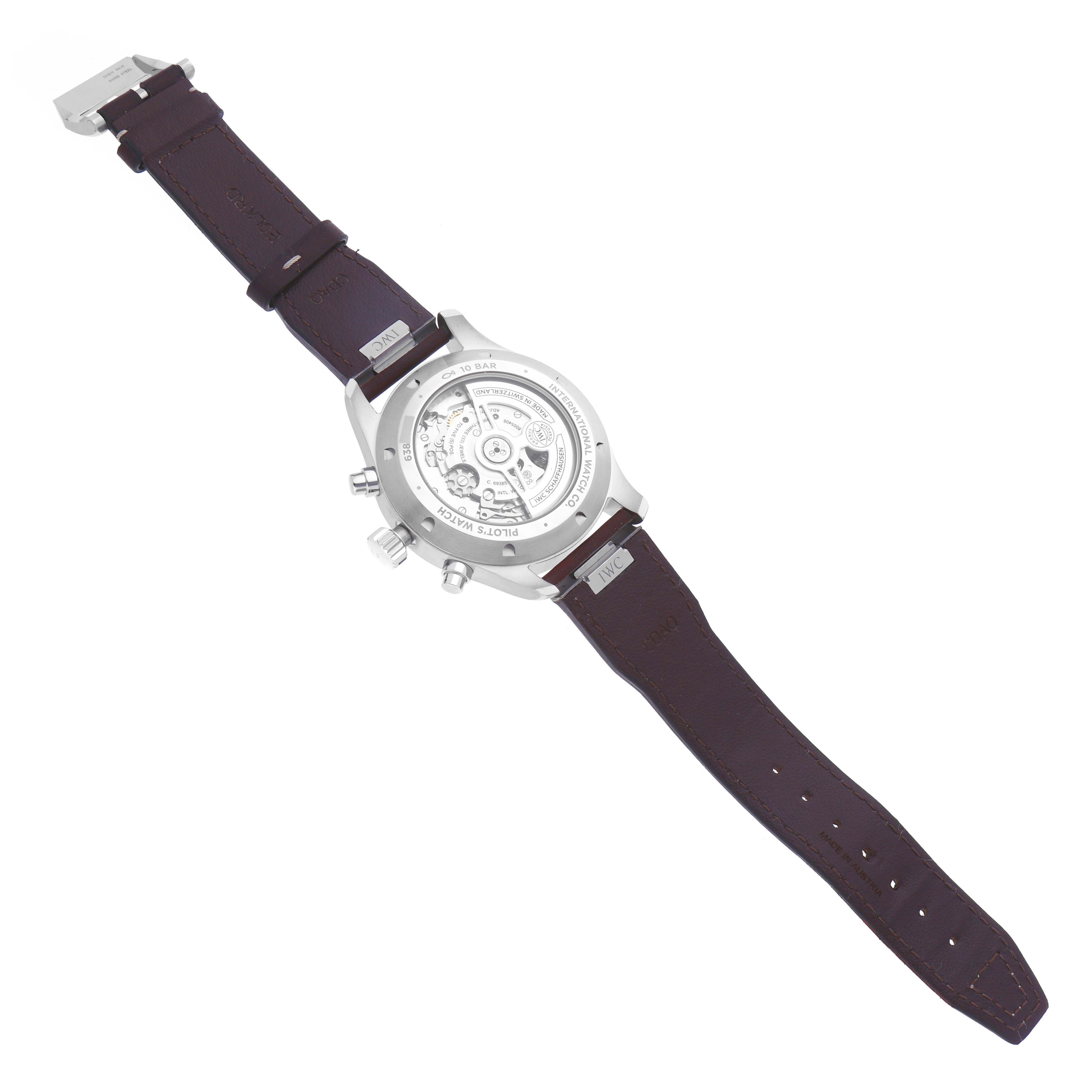 The IWC Pilot IW378005 Men's Stainless Steel Green Dial IW378005 Men's Stainless Steel Green Dial watch is shown from the back, displaying the movement and leather strap.