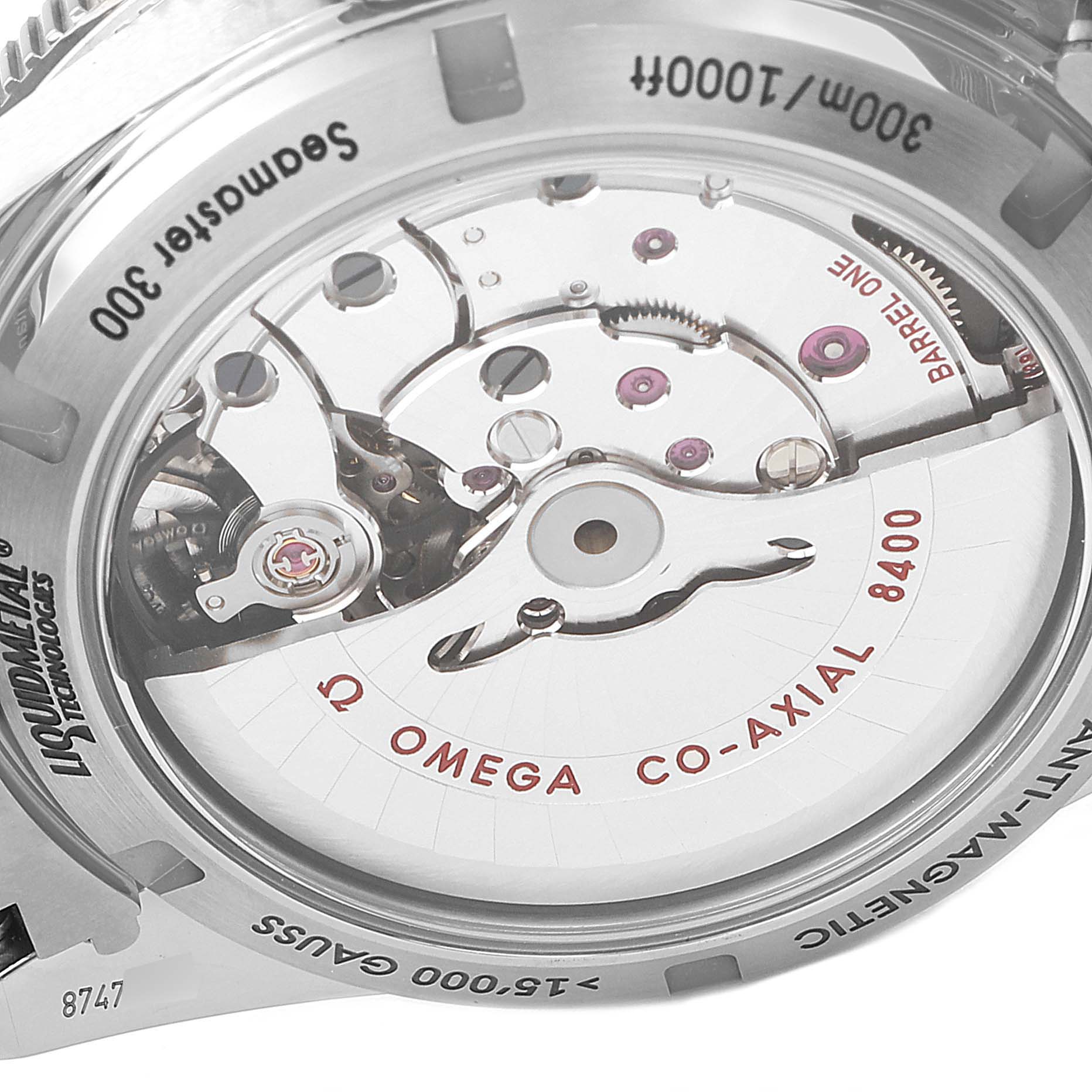 The image shows a close-up of the Omega Seamaster 233.90.41.21.03.001 Men's Titanium Blue Dial 233.90.41.21.03.001 Men's Titanium Blue Dial watch's transparent case back, revealing the co-axial 8400 movement.