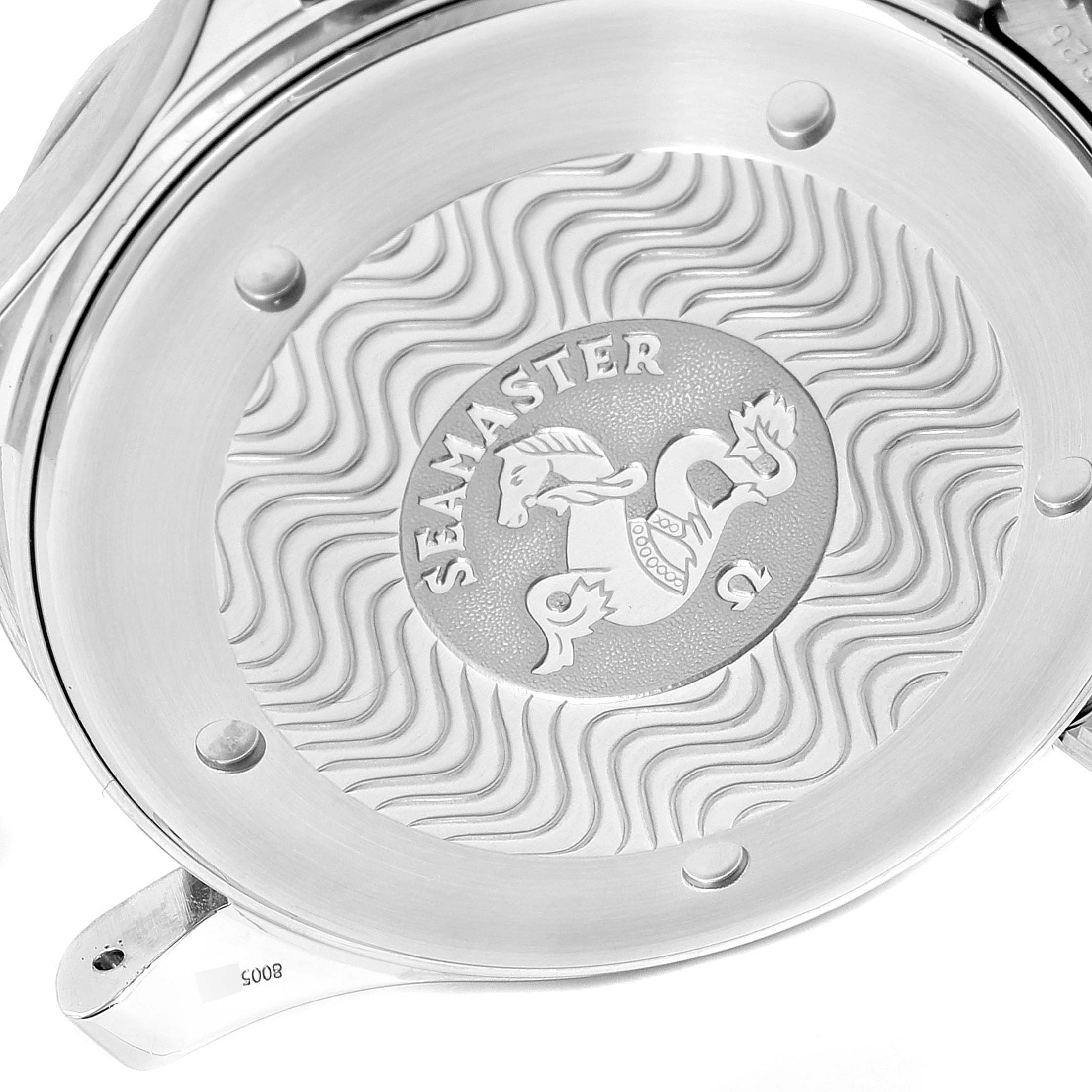 This image shows the case back of an Omega Seamaster 2531.80.00 Men's Stainless Steel Blue Dial 2531.80.00 Men's Stainless Steel Blue Dial watch with its wave pattern and logo.