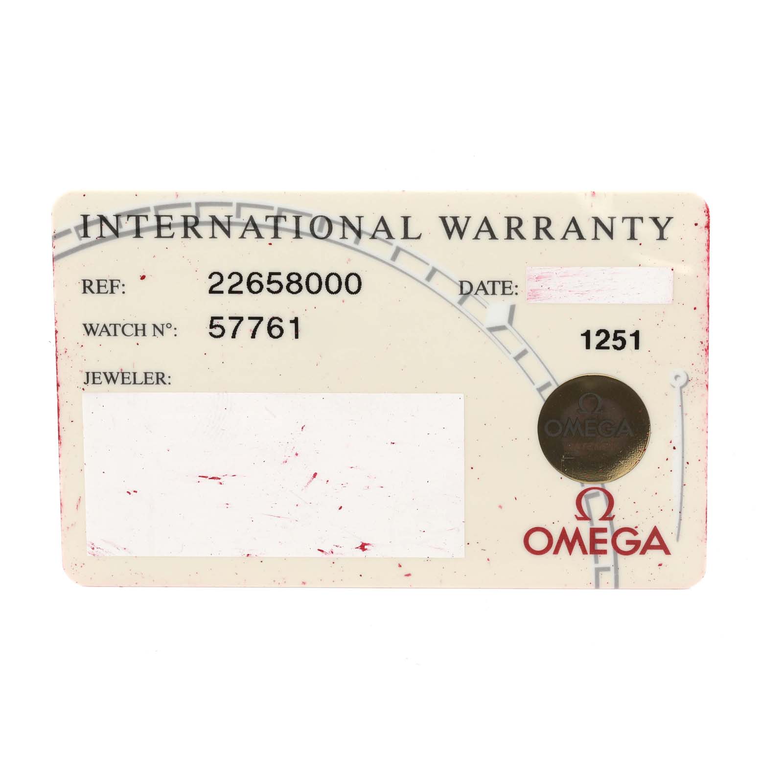 The image shows an Omega International Warranty card for the Seamaster model, including the reference number, watch number, and dealer section.