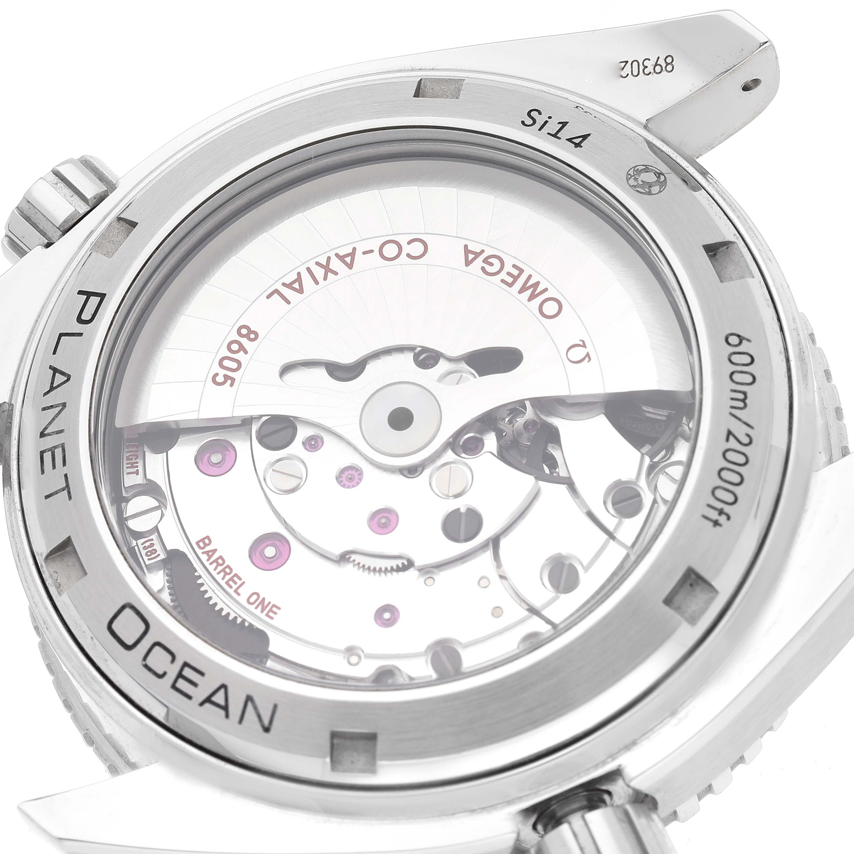 The image shows the back view of the Omega Planet Ocean 232.32.44.22.01.001 Men
s Stainless Steel Black Dial 232.32.44.22.01.001 Men
s Stainless Steel Black Dial watch, highlighting its inner mechanics and sapphire crystal case back.