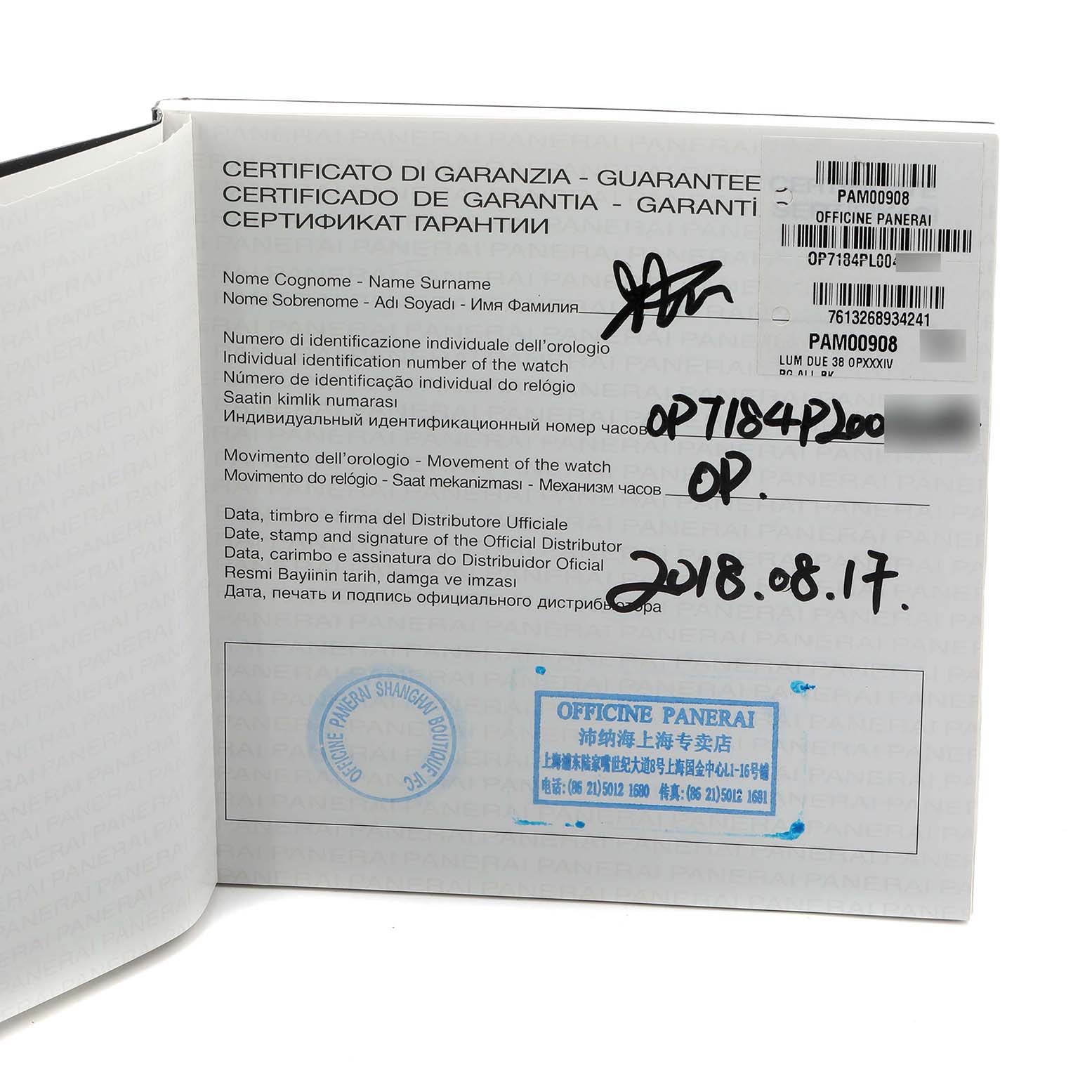 The image shows a guarantee certificate for a Panerai Luminor PAM00908 Men's Rose Gold Black Dial model, featuring text and multiple stamps.