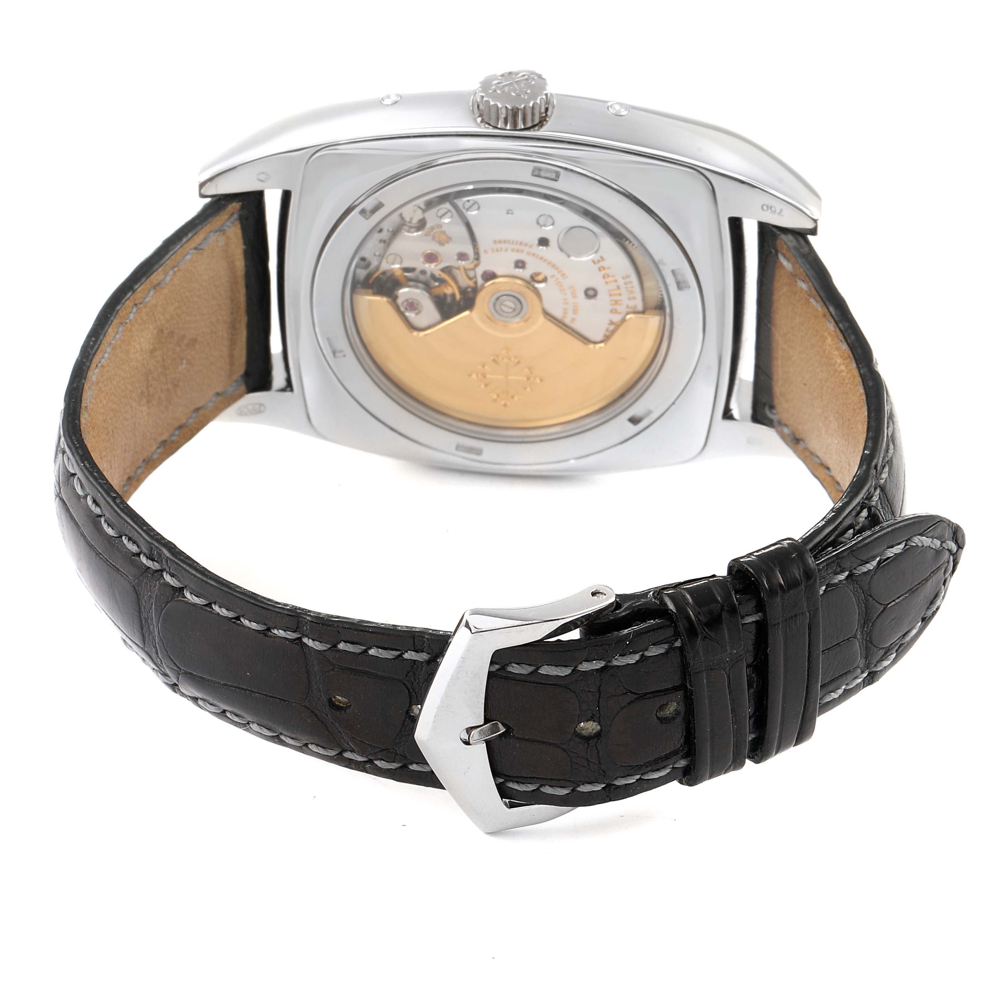 The image shows the back view of a Patek Philippe Gondolo 5135G Men's White Gold Silver Dial 5135G Men's White Gold Silver Dial watch, highlighting its movement and leather strap.