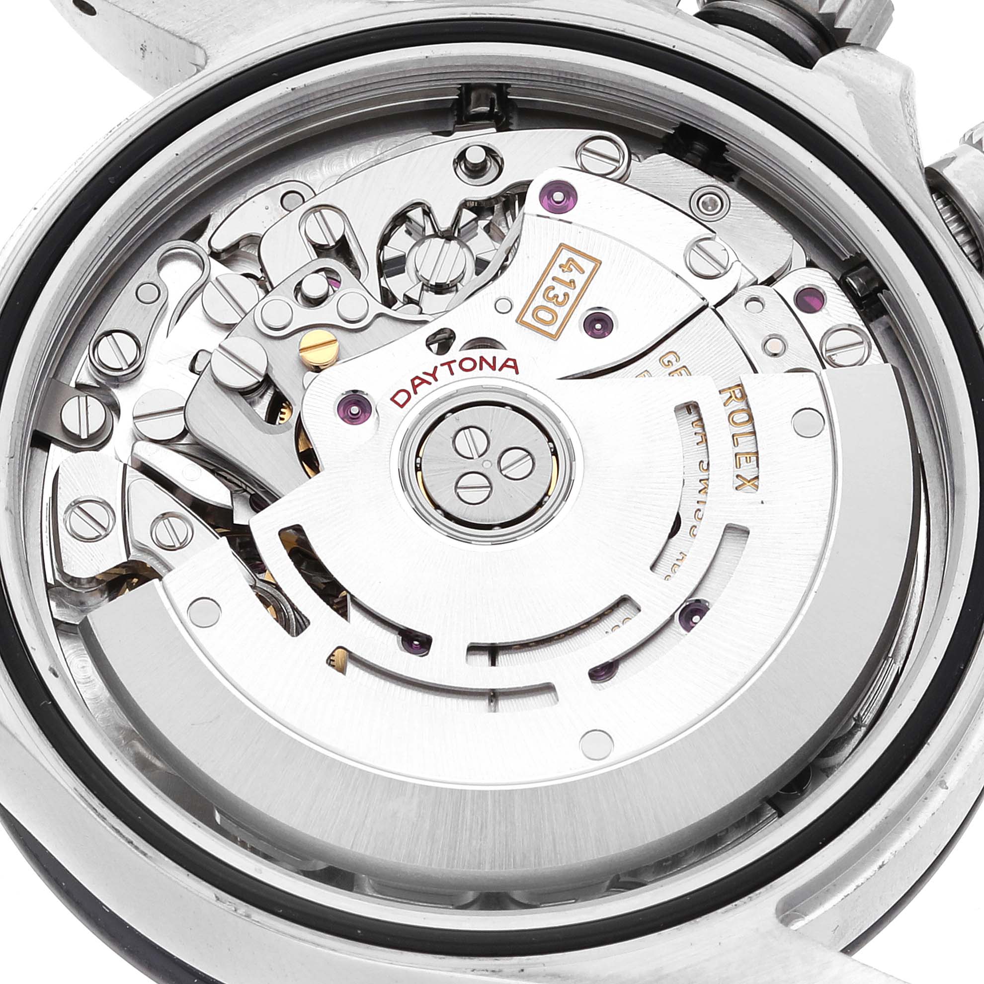The image shows an up-close view of the movement inside a Rolex Daytona 116500 Men's Stainless Steel Black Dial 116500 Men's Stainless Steel Black Dial watch, showcasing its intricate inner mechanisms.