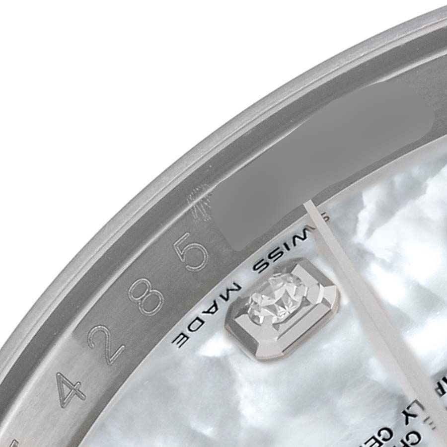 The image shows a close-up of the dial and inner bezel of a Rolex Datejust 116234 Men's Stainless Steel Mother of Pearl Dial 116234 Men's Stainless Steel Mother of Pearl Dial watch, displaying the indices and "SWISS MADE" text.