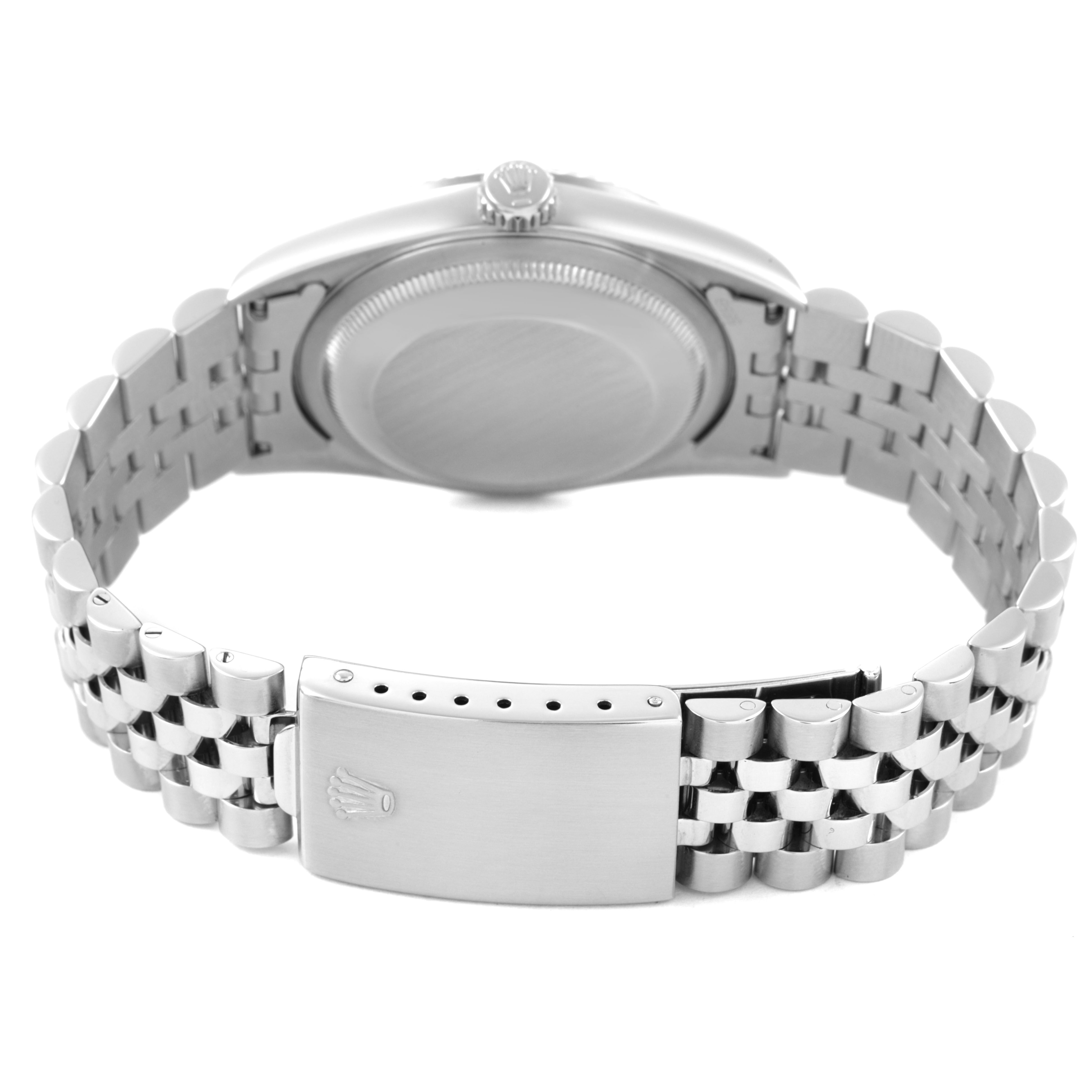 The image shows the back of a Rolex Datejust 16234 Men's Stainless Steel Silver Dial watch, showcasing the case back and Jubilee bracelet with the clasp visible.