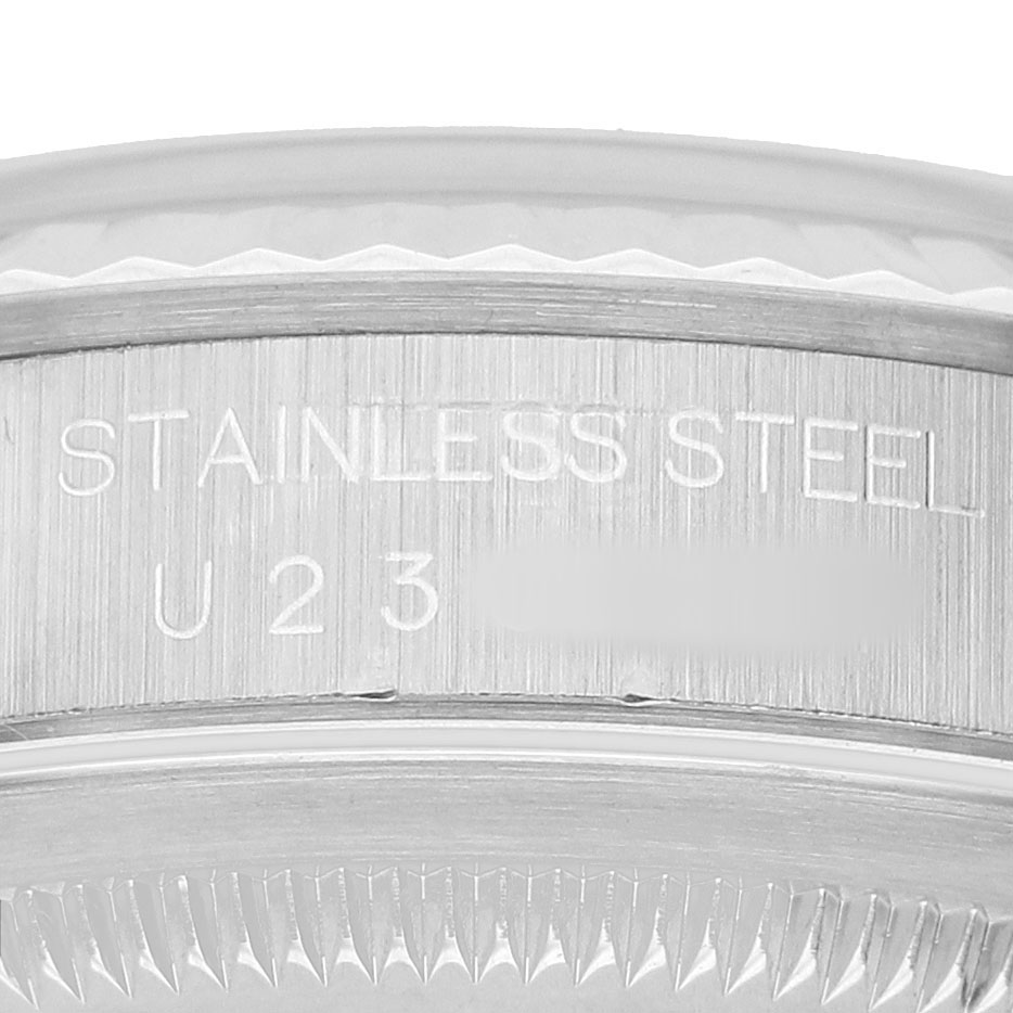 The image shows a close-up of the stainless steel back case of a Rolex Datejust 16234 Men's Stainless Steel Silver Dial watch.