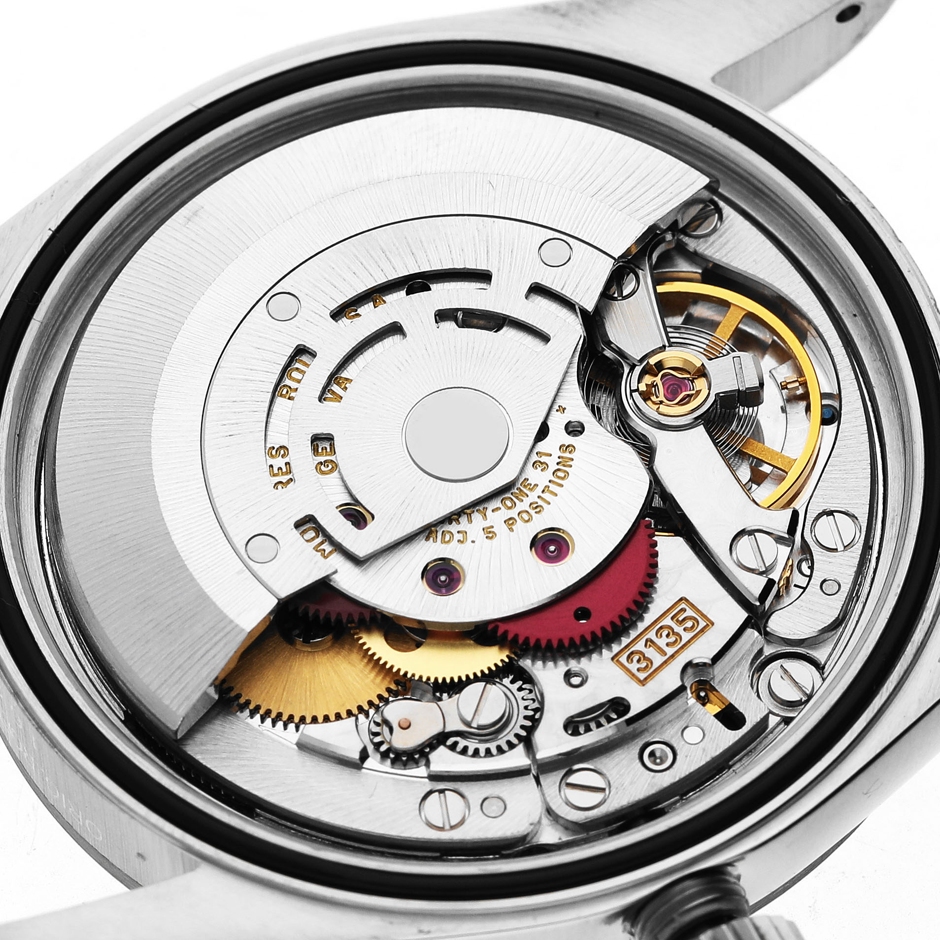 The image shows the internal movement of a Rolex Datejust 16234 Men's Stainless Steel Silver Dial watch from a top-down angle, displaying gears and the rotor.