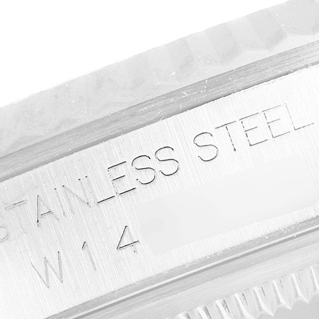 This image shows a close-up view of the case side with engraved text of a Rolex Datejust 16234 Men's Stainless Steel Pink Dial 16234 Men's Stainless Steel Pink Dial model watch.