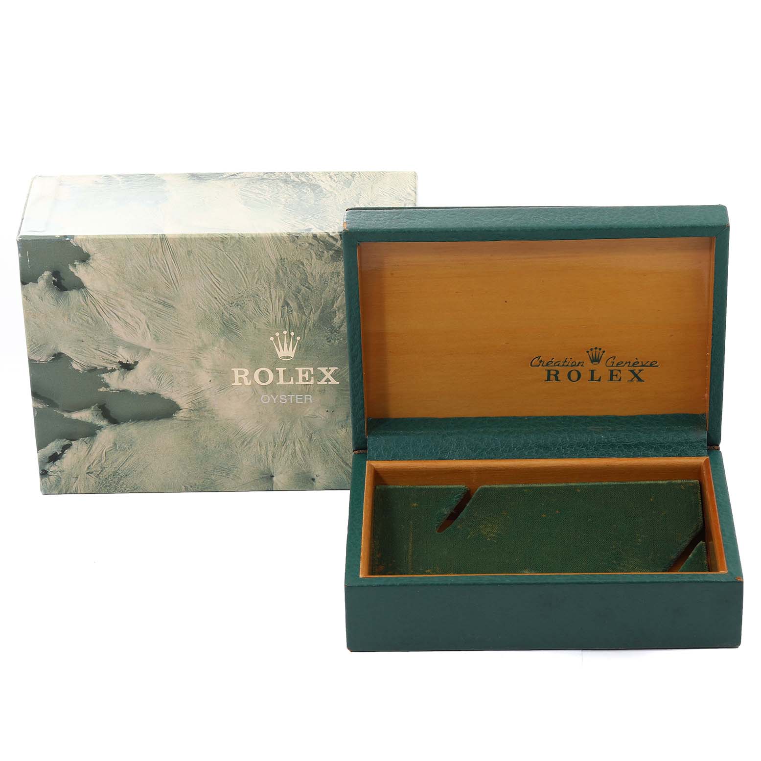 The image shows an open display box for the Vintage Collection model by Rolex, with the outer packaging also visible.