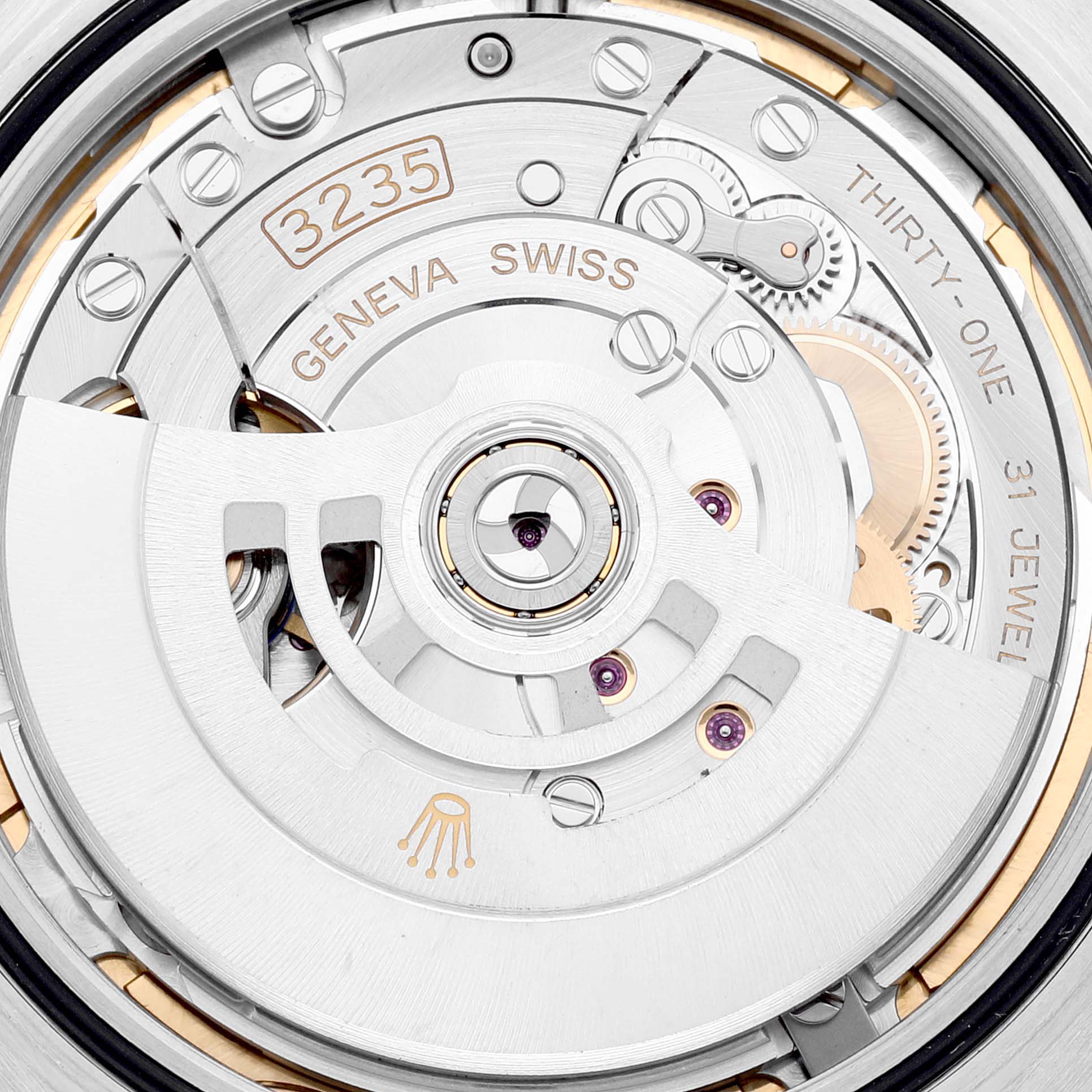 The image shows a close-up of the Rolex Datejust 41 126334 Men
s Stainless Steel Mother of Pearl Dial 126334 Men
s Stainless Steel Mother of Pearl Dial
s 3235 movement mechanism from a top-down angle, highlighting its intricate components.