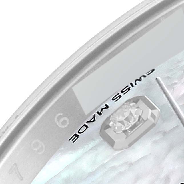 This close-up image shows the dial of a Rolex Datejust 41 126334 Men
s Stainless Steel Mother of Pearl Dial 126334 Men
s Stainless Steel Mother of Pearl Dial, highlighting the "Swiss Made" text and a diamond marker.