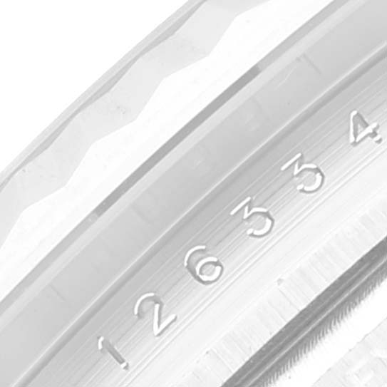 This image shows a close-up of the serial number engraved inside the bezel of the Rolex Datejust 41 126334 Men
s Stainless Steel Mother of Pearl Dial 126334 Men
s Stainless Steel Mother of Pearl Dial watch.