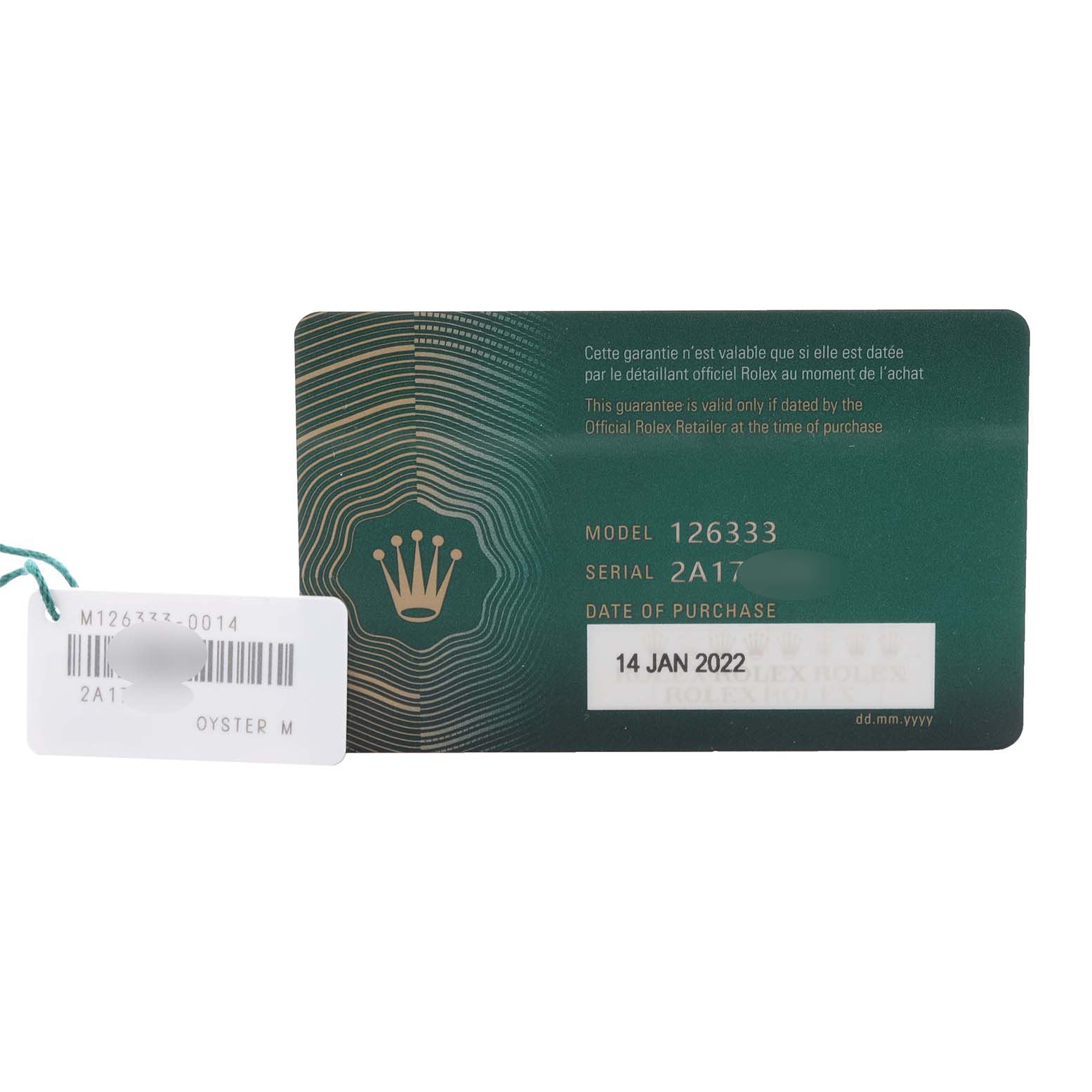 The image shows a Rolex Datejust warranty card and a tag with model details.