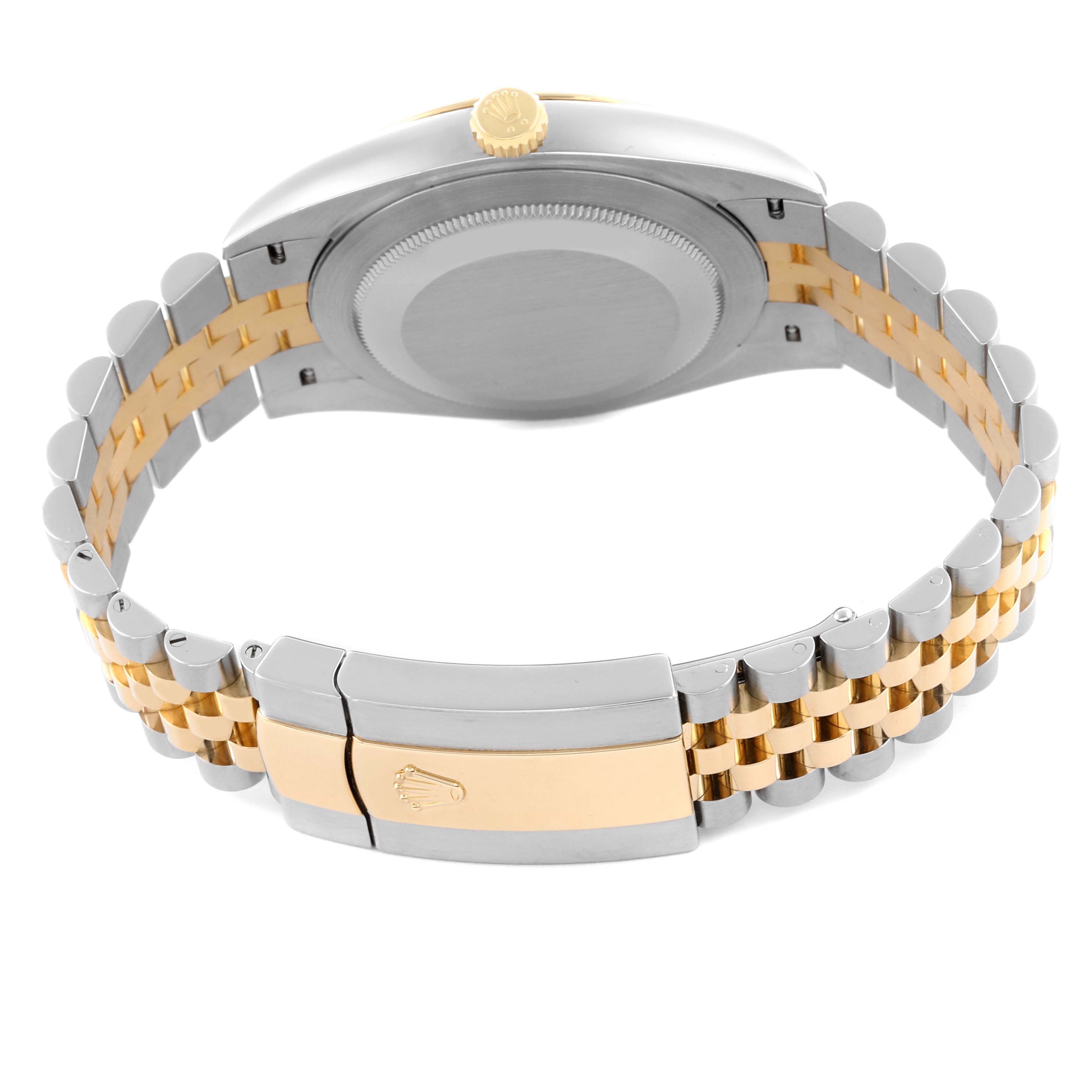 The image shows the back and side of a Rolex Datejust watch, highlighting its two-tone bracelet and clasp.