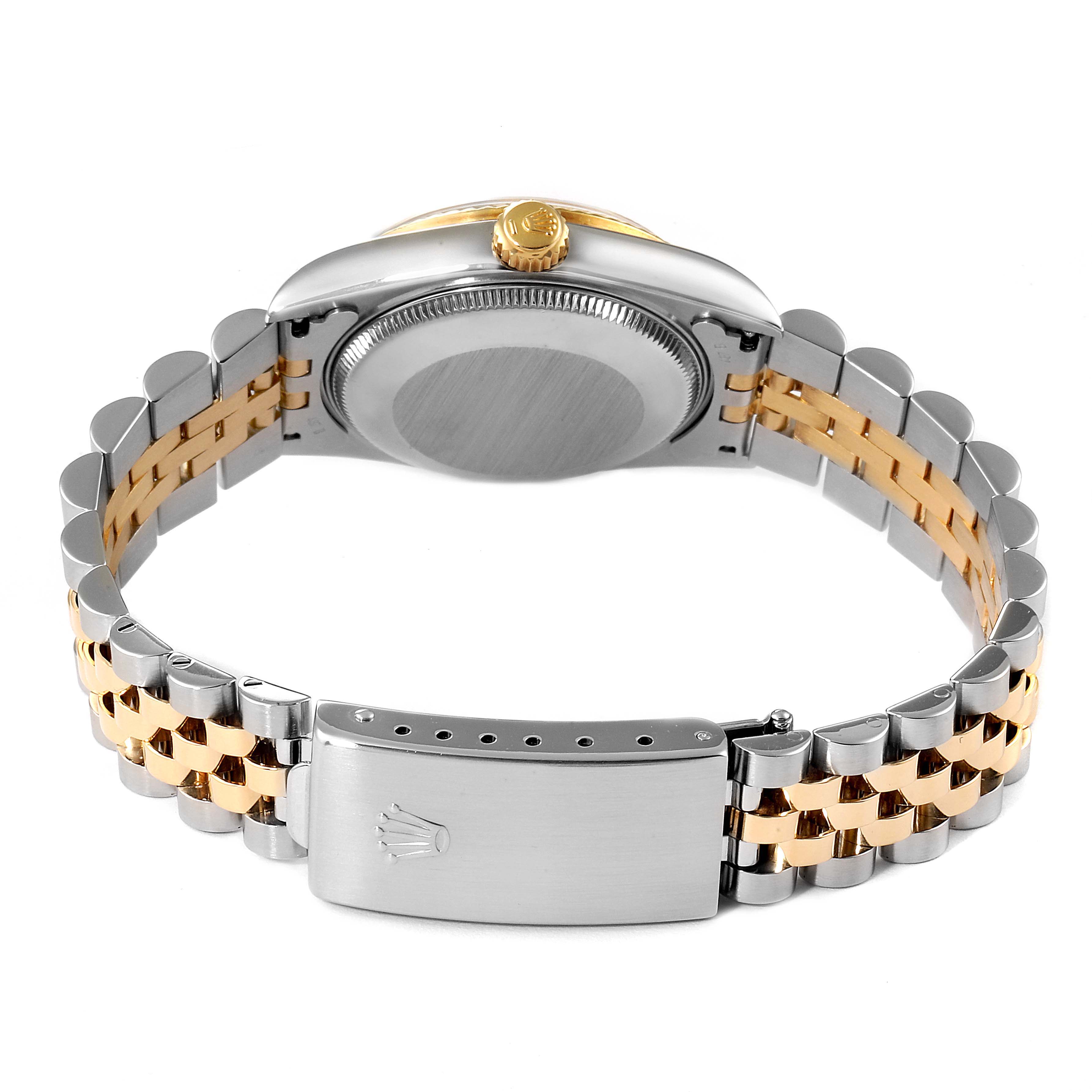 The image shows the back view of a Mid-Size Rolex watch, highlighting the case back and two-tone Jubilee bracelet.