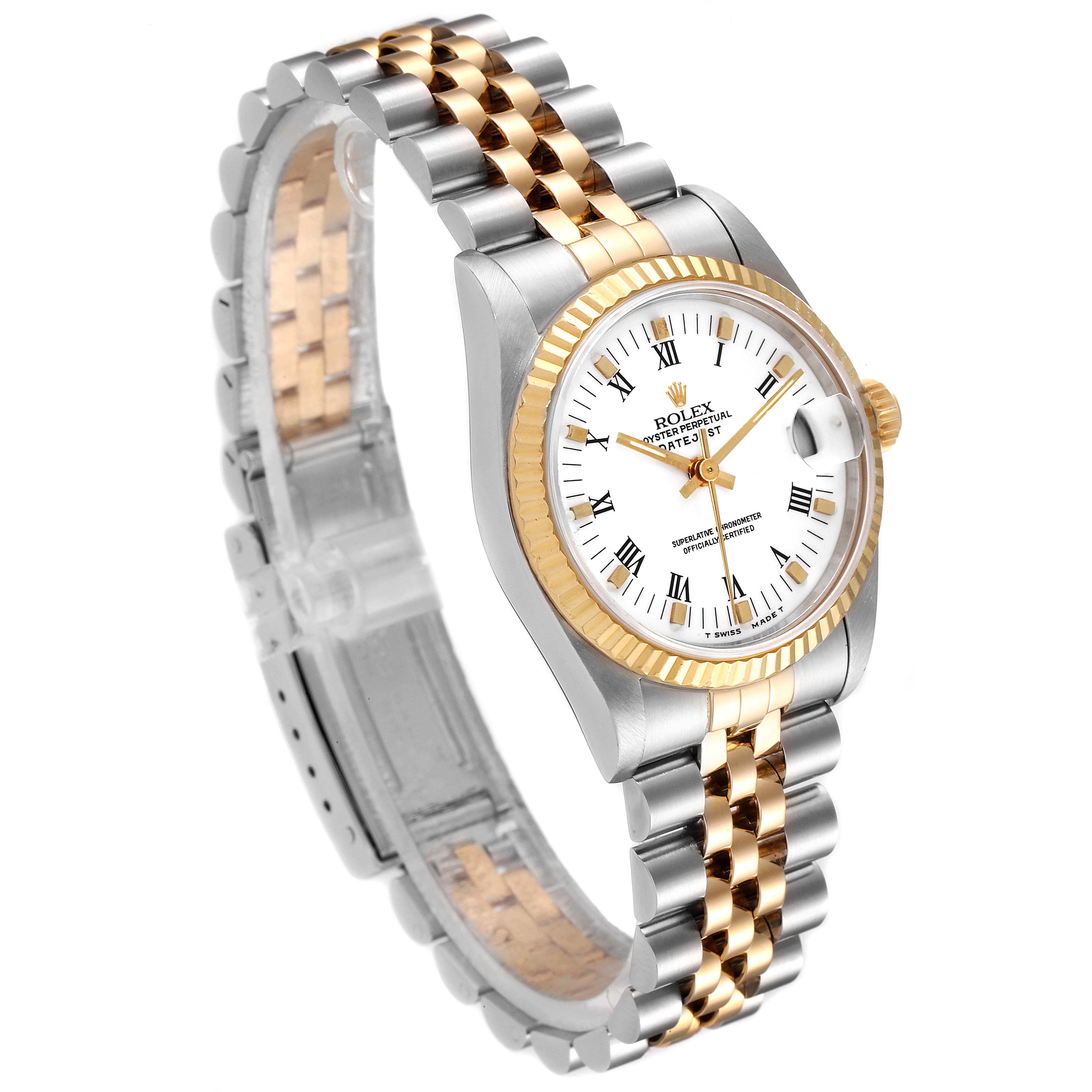 The image shows a Rolex Mid-Size 68273 Women's Steel and Gold (two tone) White Dial 68273 Women's Steel and Gold (two tone) White Dial model from a three-quarter front angle, highlighting the band, bezel, and dial.