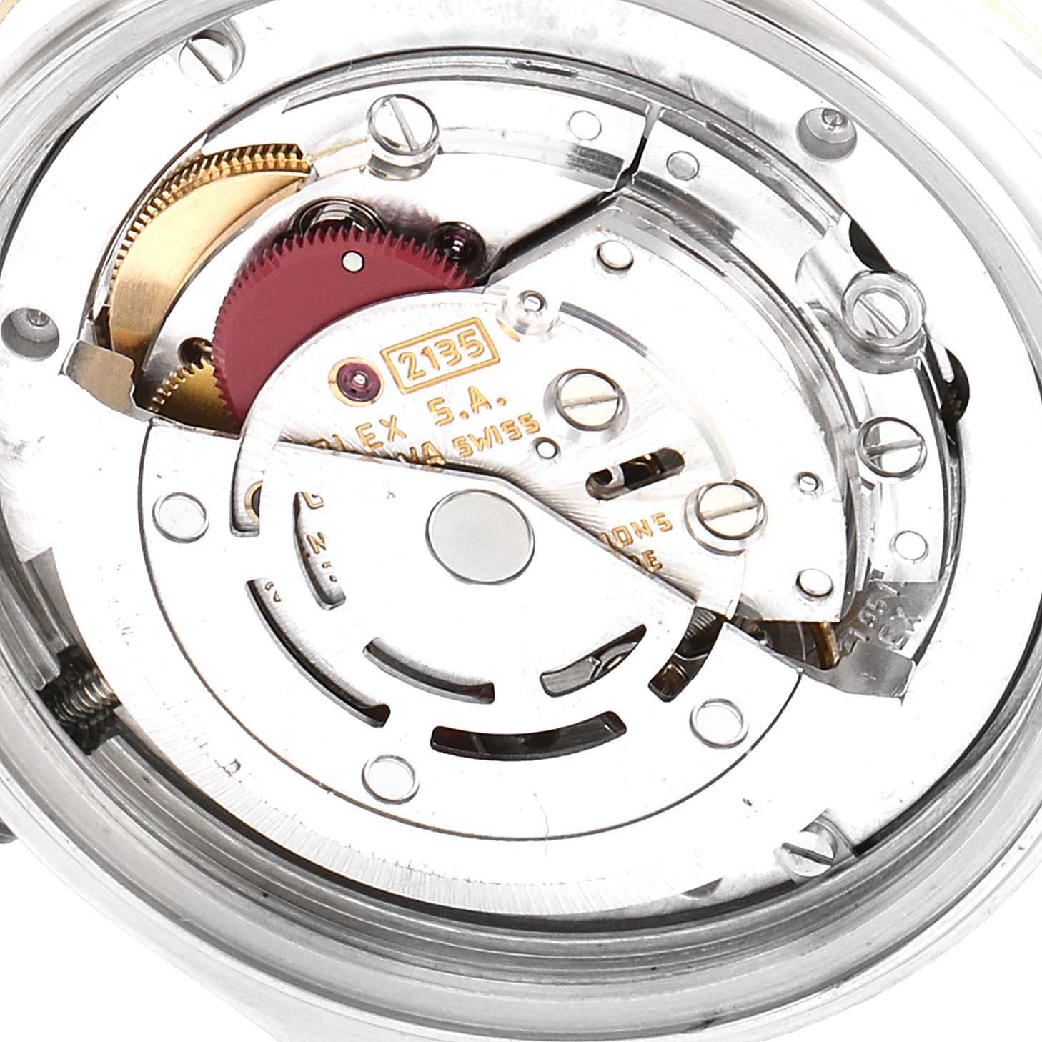 The image shows the movement mechanism of a Rolex Mid-Size 68273 Women's Steel and Gold (two tone) White Dial 68273 Women's Steel and Gold (two tone) White Dial model watch from a rear angle, showcasing its internal components.