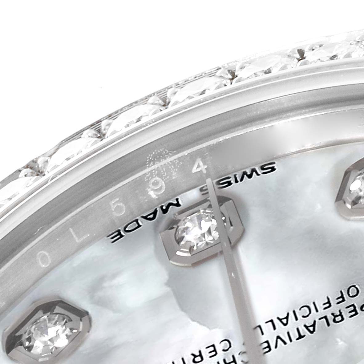 The image shows a close-up of the dial, bezel, and diamond hour markers of a Rolex Mid-Size 178384 Women
s Stainless Steel Mother of Pearl Dial 178384 Women
s Stainless Steel Mother of Pearl Dial model watch.