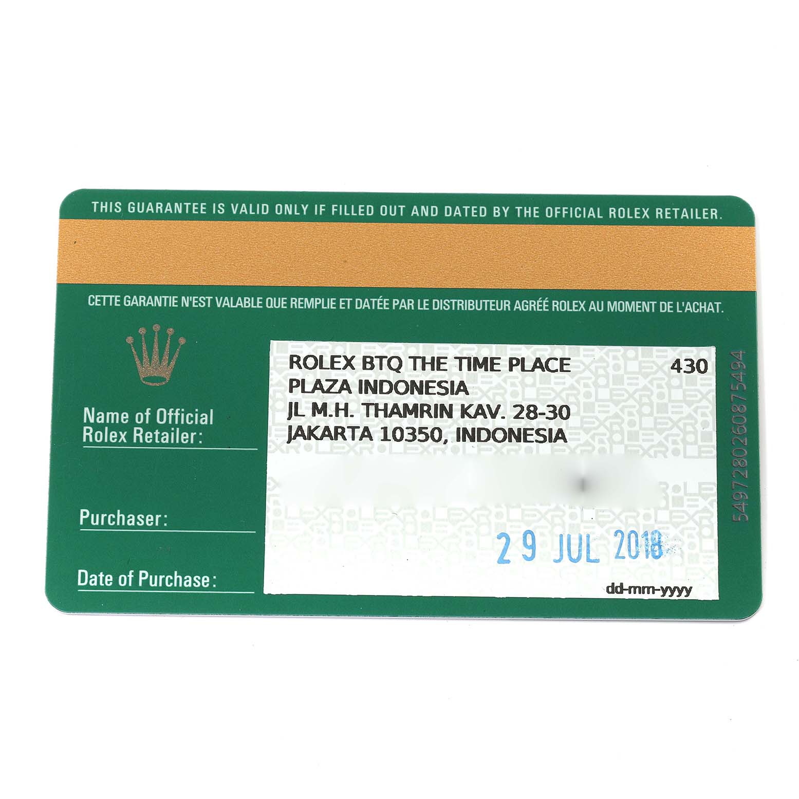 The image shows a guarantee card for a Mid-Size Rolex watch, providing details of the authorized dealer and date of purchase.