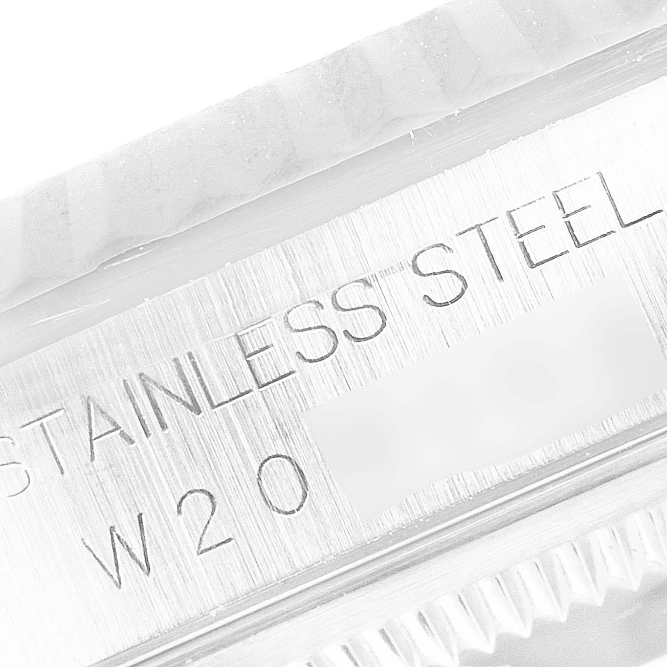 This image shows a close-up of the stainless steel marking on the case of a Rolex Datejust 16234 Men's Stainless Steel Silver Dial 16234 Men's Stainless Steel Silver Dial watch.