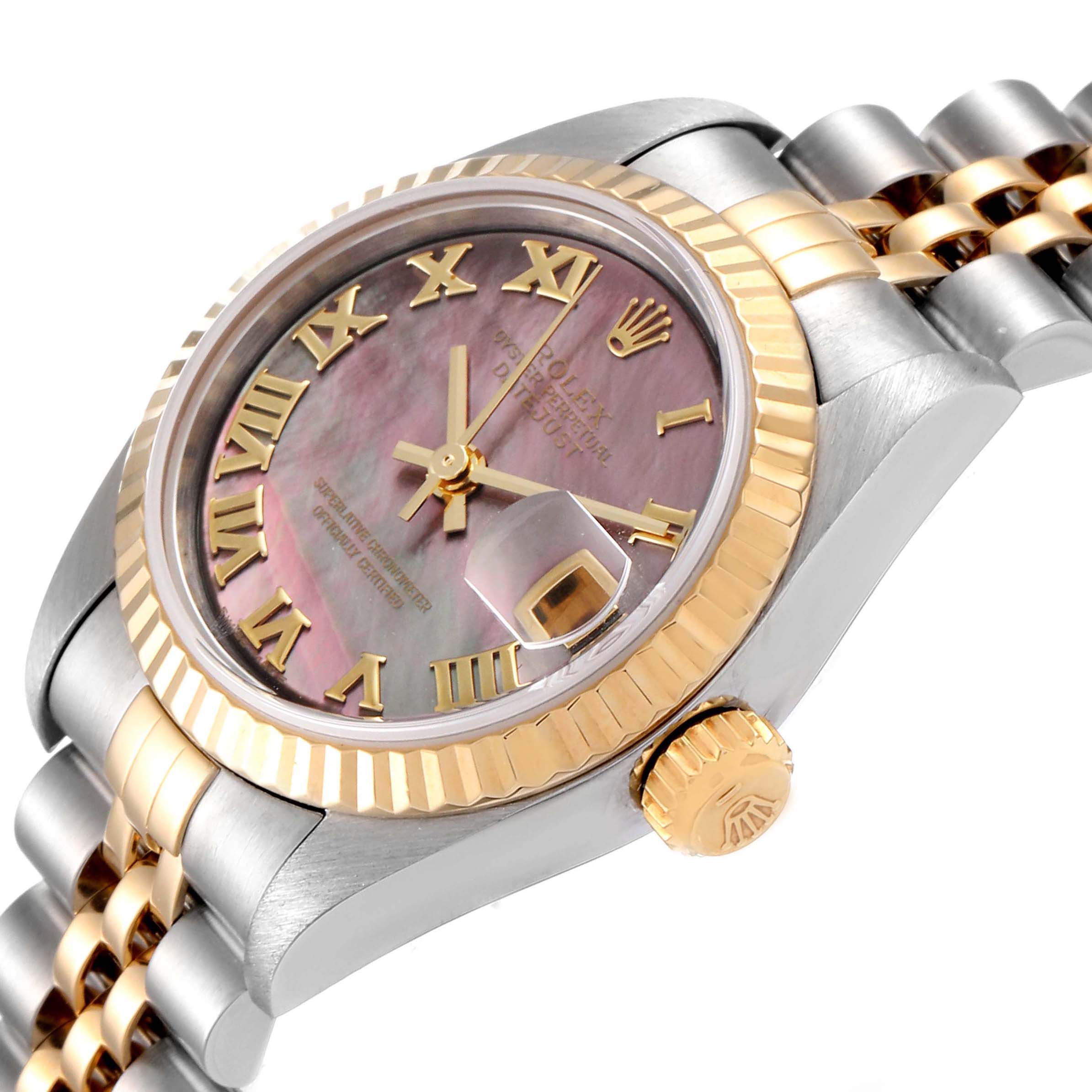 The Rolex Datejust 79173 Women's Steel and Gold (two tone) Mother of Pearl Dial 79173 Women's Steel and Gold (two tone) Mother of Pearl Dial watch is shown from an angled close-up, highlighting its face, fluted bezel, crown, and partial bracelet.