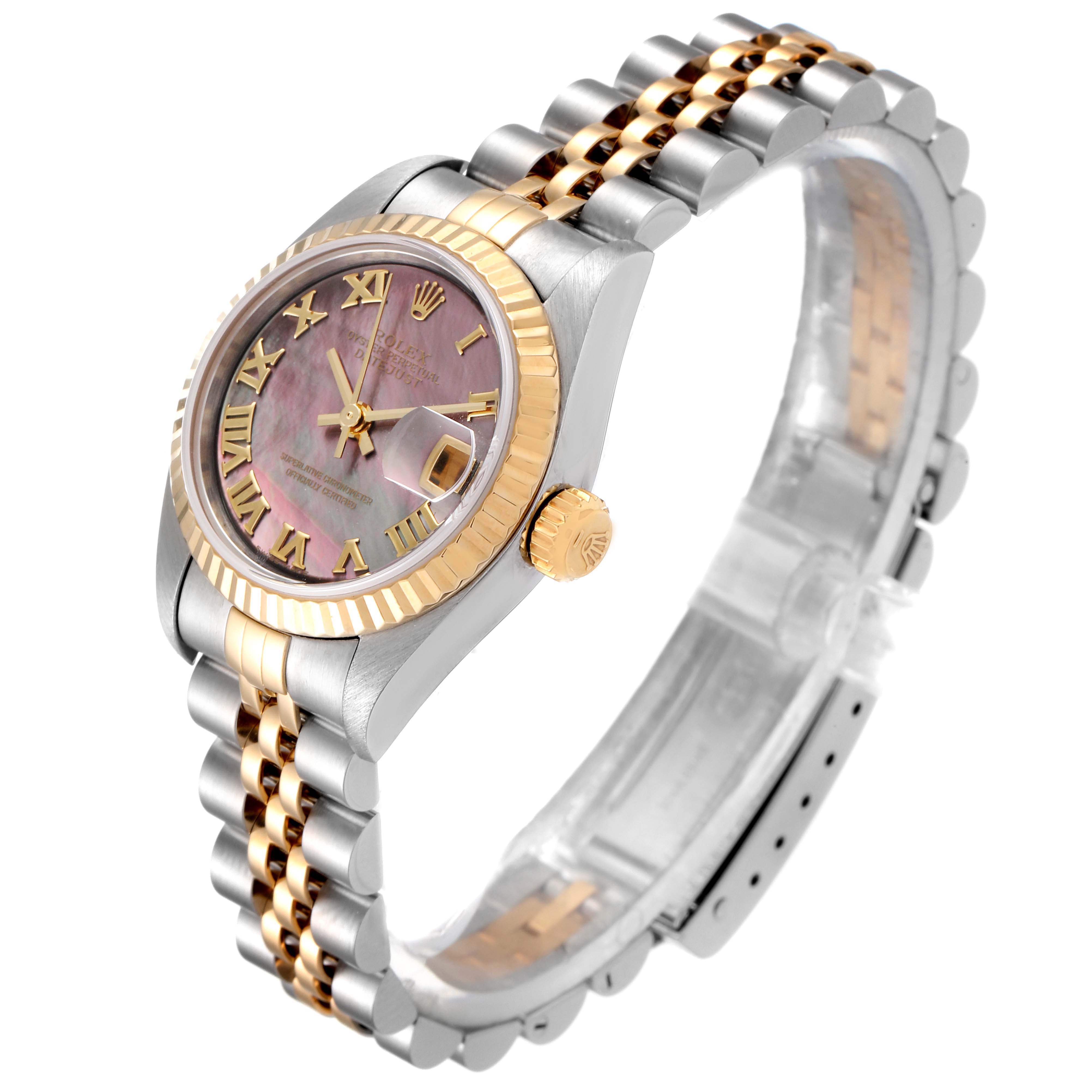 The image shows a Rolex Datejust 79173 Women's Steel and Gold (two tone) Mother of Pearl Dial 79173 Women's Steel and Gold (two tone) Mother of Pearl Dial watch from an angled side view, highlighting the case, dial, bezel, crown, and bracelet.