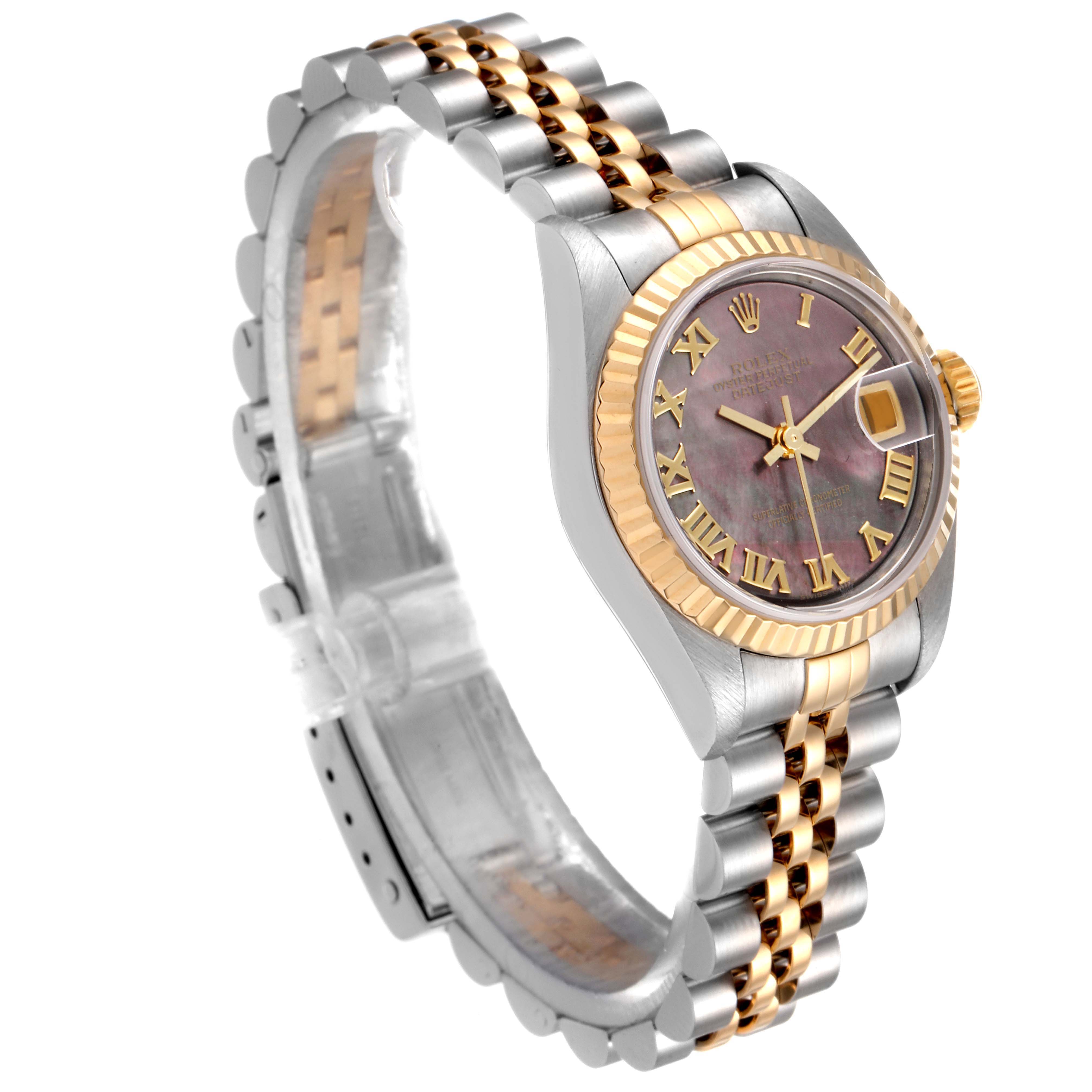 The image shows a Rolex Datejust 79173 Women's Steel and Gold (two tone) Mother of Pearl Dial 79173 Women's Steel and Gold (two tone) Mother of Pearl Dial watch at a three-quarter angle, highlighting the face, bezel, and bi-metal bracelet.