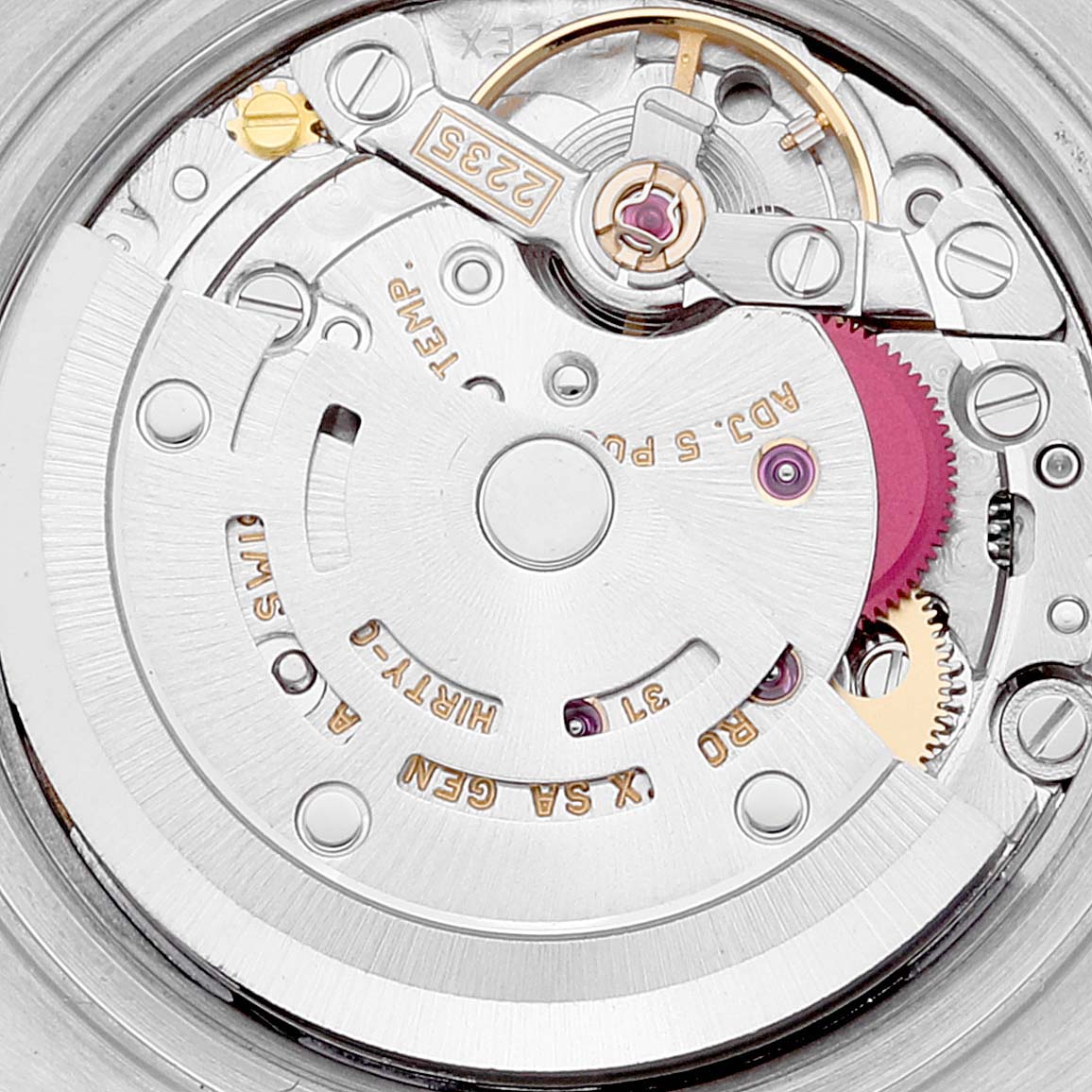 Close-up top view of the internal movement mechanism of a Rolex Datejust 79173 Women
s Steel and Gold (two tone) Red Dial 79173 Women
s Steel and Gold (two tone) Red Dial watch.