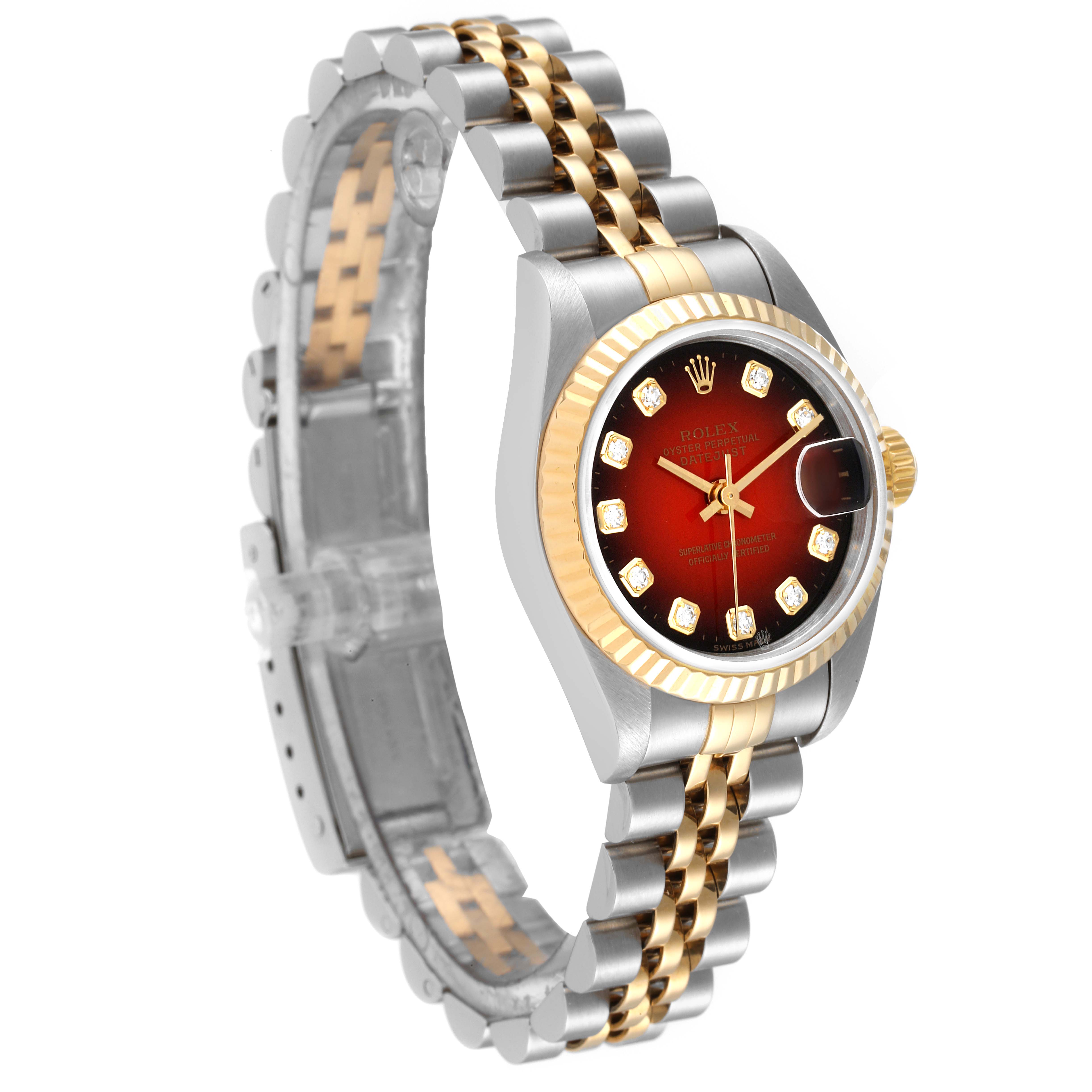 The image shows a side angle of a Rolex Datejust 79173 Women
s Steel and Gold (two tone) Red Dial 79173 Women
s Steel and Gold (two tone) Red Dial watch, highlighting its two-tone bracelet and fluted bezel.