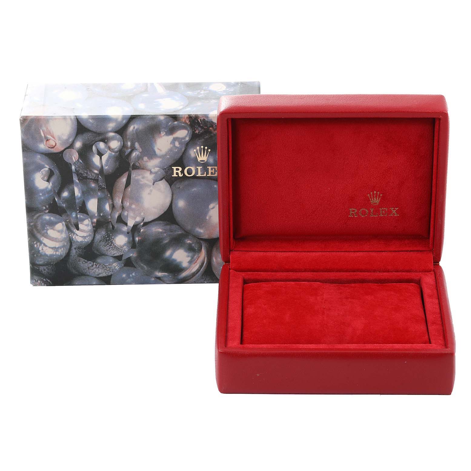 The image shows a Rolex Datejust 79173 Women
s Steel and Gold (two tone) Red Dial 79173 Women
s Steel and Gold (two tone) Red Dial watch box and its open red velvet interior, with an outer decorative box behind it.